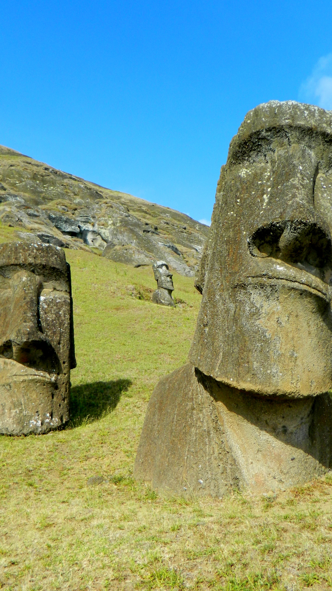 Moai statues, Rapa Nui heritage, Sacred monolithic figures, Bing wallpaper, 1080x1920 Full HD Phone