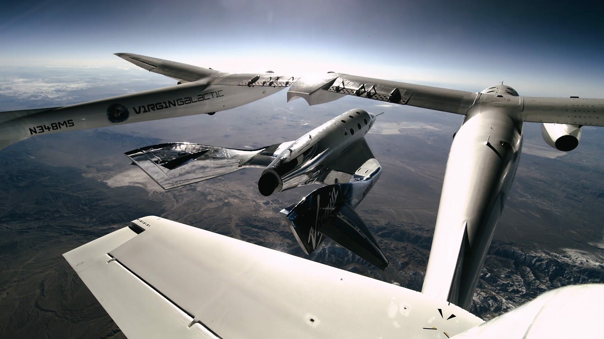 Virgin Galactic: A commercial spaceline that develops commercial spacecrafts. 1920x1080 Full HD Wallpaper.