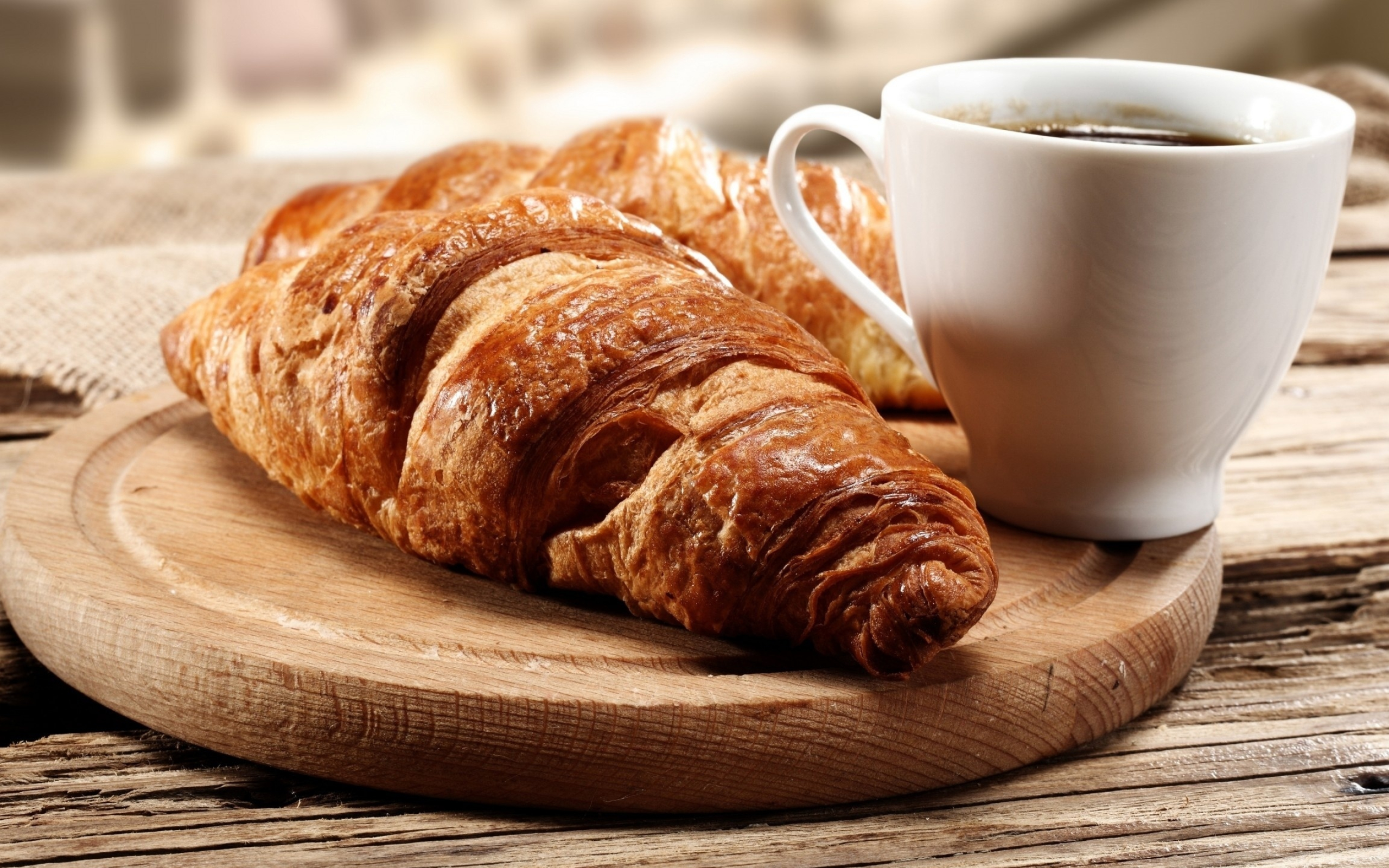 Croissant: The dough is made with flour, butter, water, sugar, salt, and yeast. 2560x1600 HD Background.