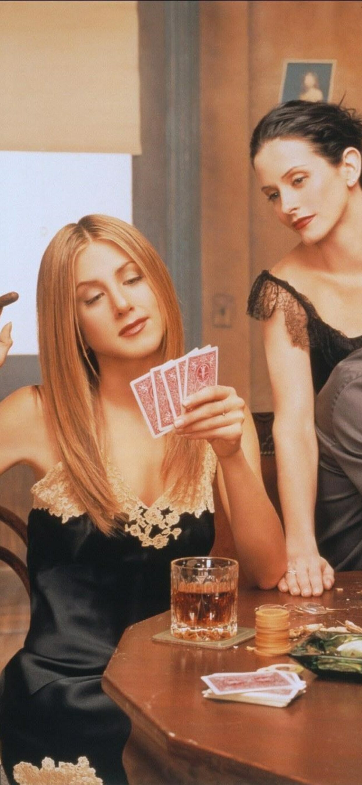 Friends (TV Series): Jennifer Aniston as Rachel Green, Courteney Cox as Monica Geller. 1250x2690 HD Wallpaper.