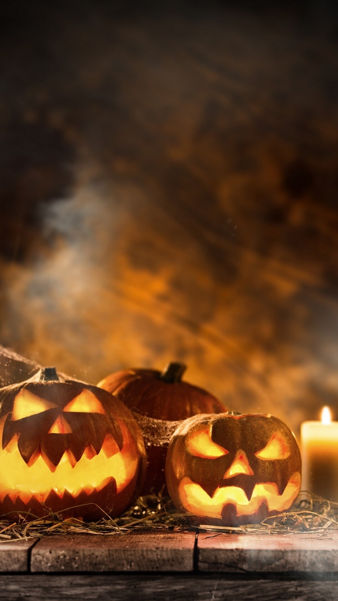 Halloween: Celebration of the spirits of the dead, Candle and pumpkins, Jack-o'-lantern. 1080x1920 Full HD Wallpaper.