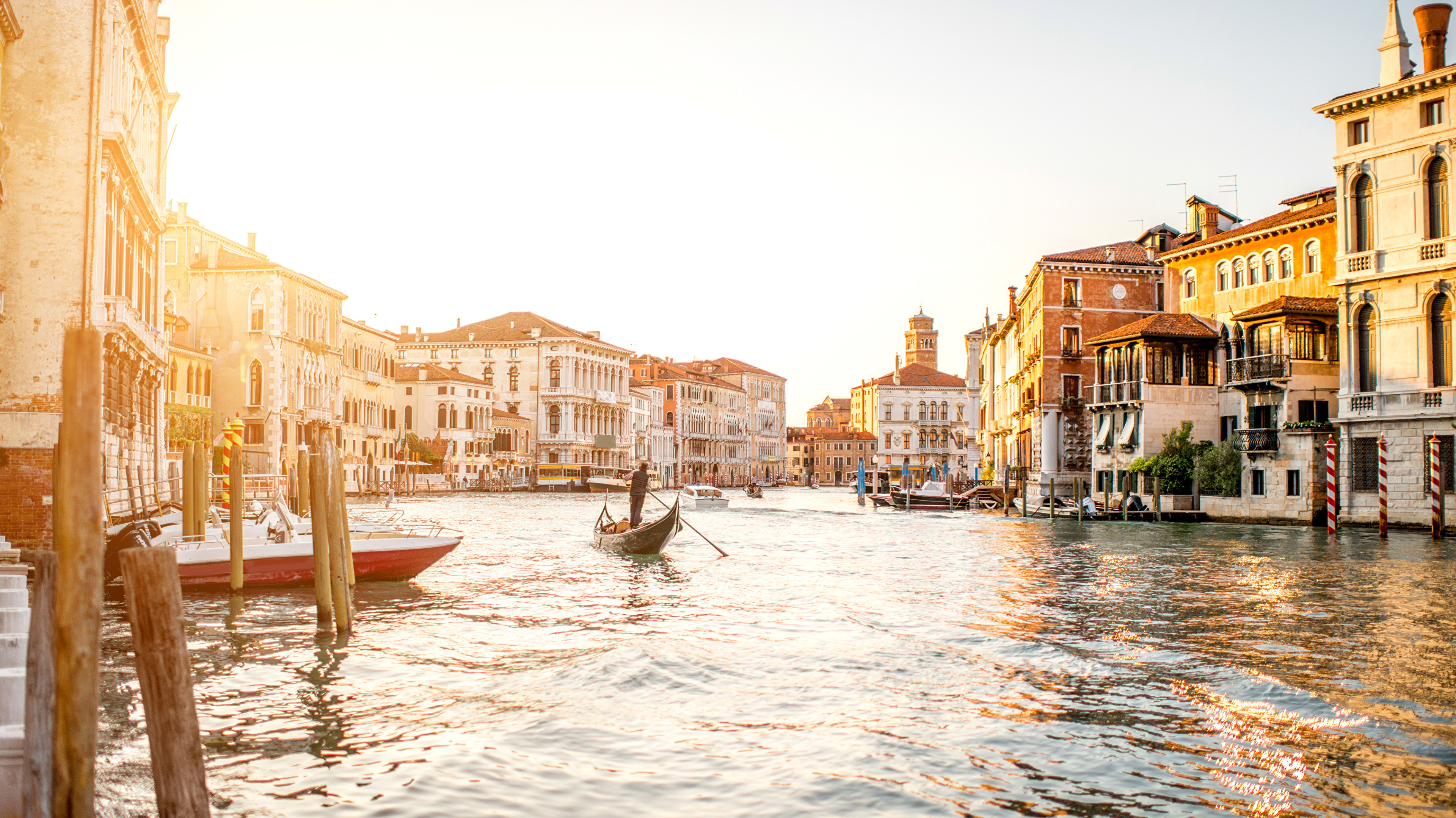 Gondola: Propelled by a person, who uses a rowing oar, Venice. 3840x2160 4K Background.