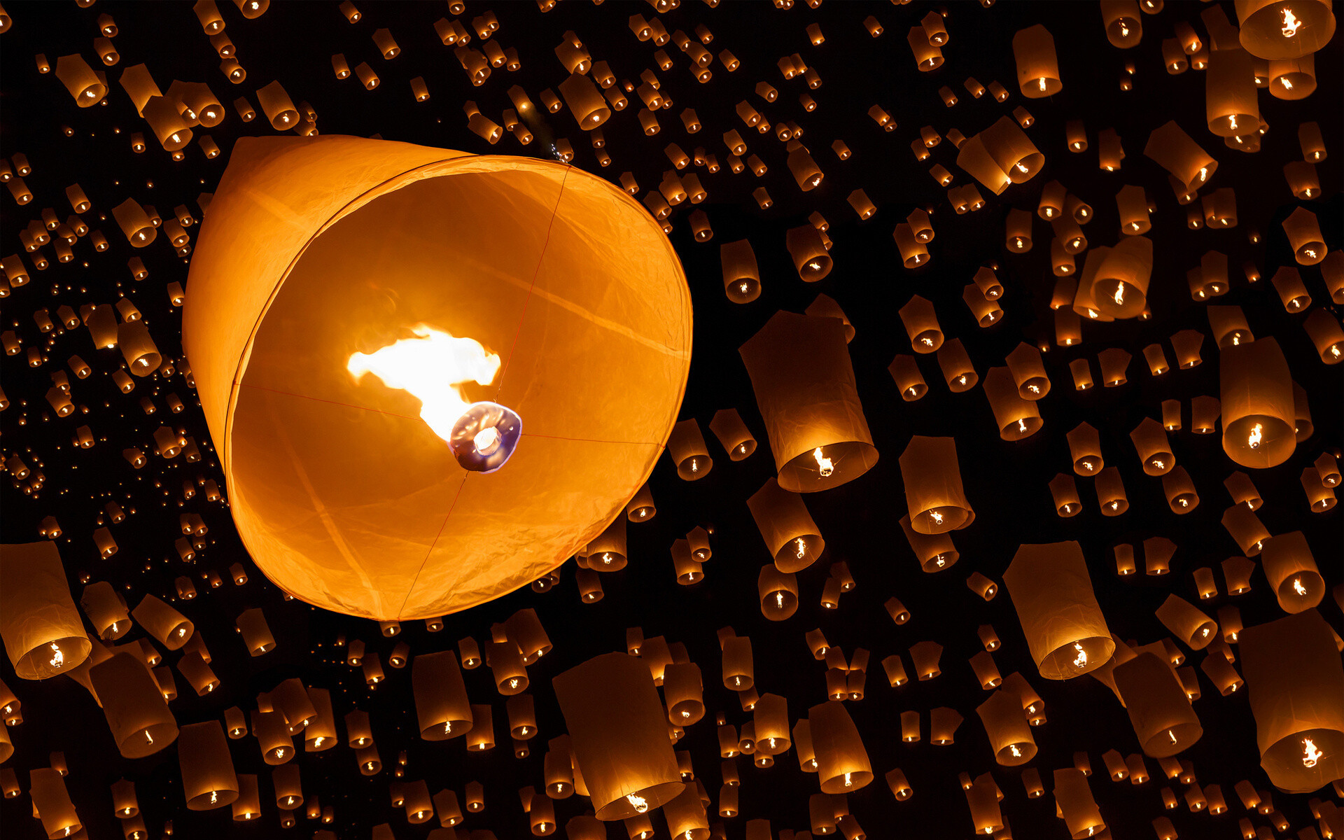 Lanterns: Hot air balloons made of paper with a small fire. 1920x1200 HD Background.
