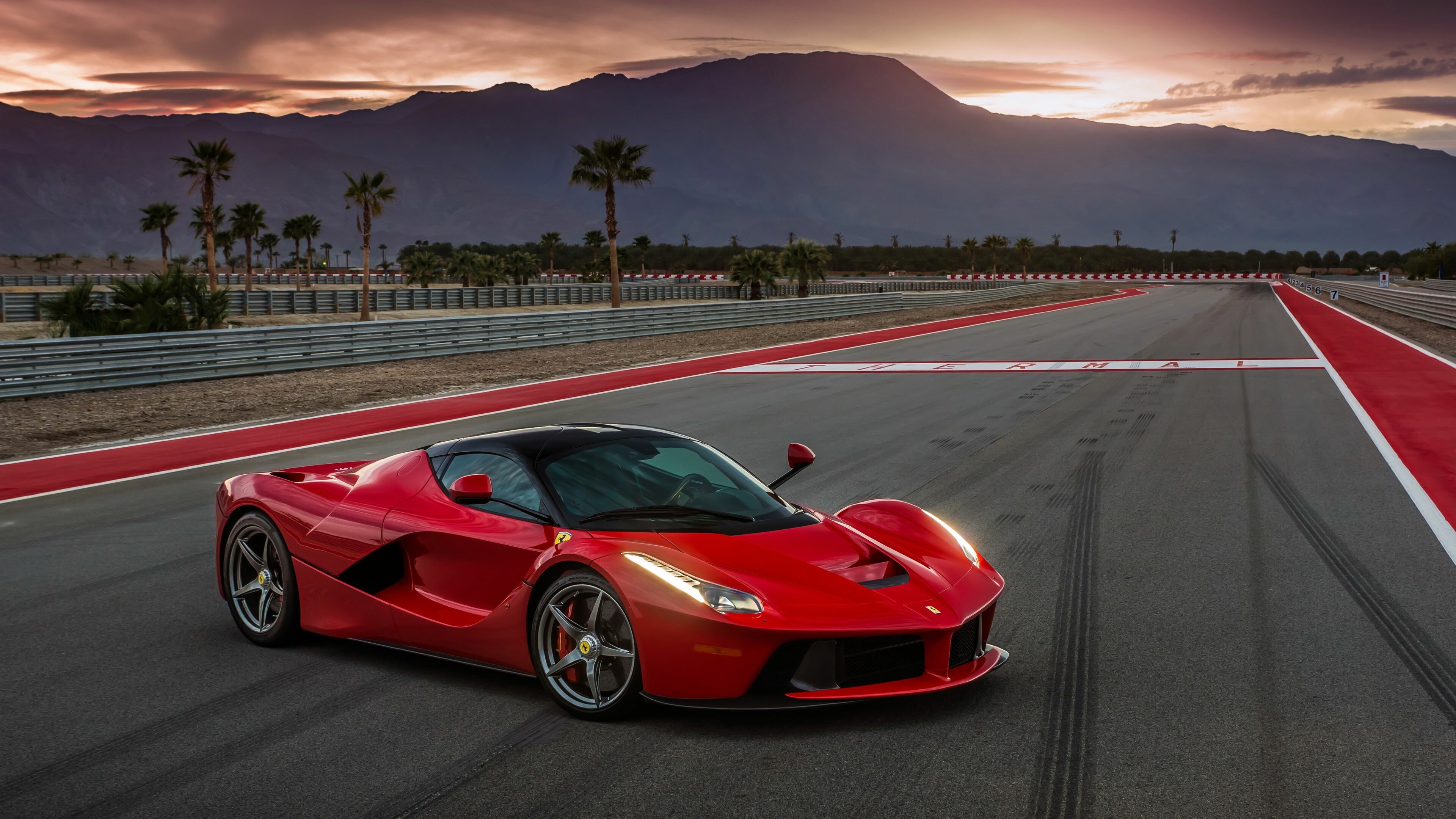Ferrari: An Italian luxury sports car manufacturer based in Maranello, Italy. 3840x2160 4K Background.