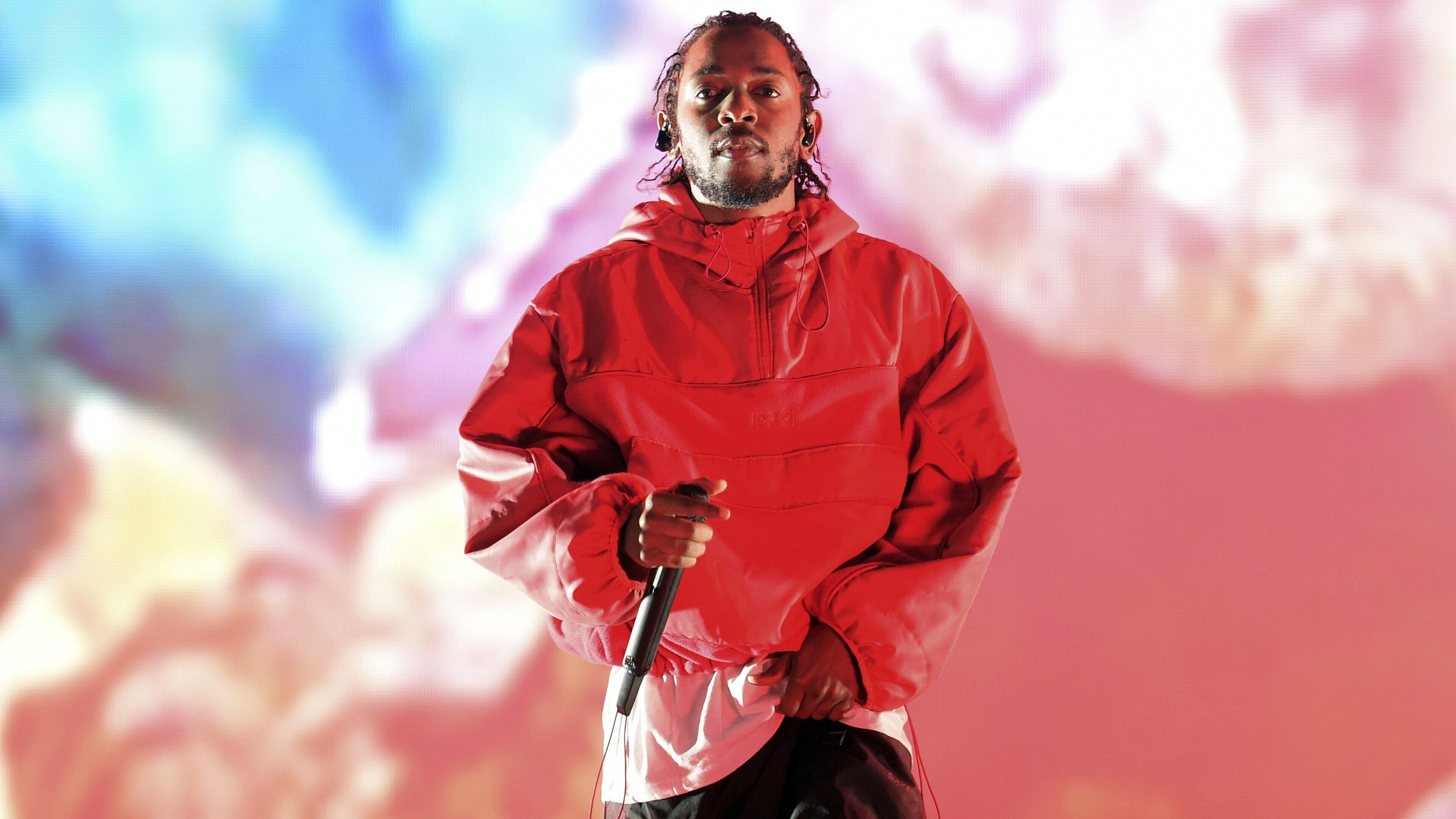 Kendrick Lamar: An American rapper, known for his progressive musical styles and socially conscious songwriting. 3840x2160 4K Background.