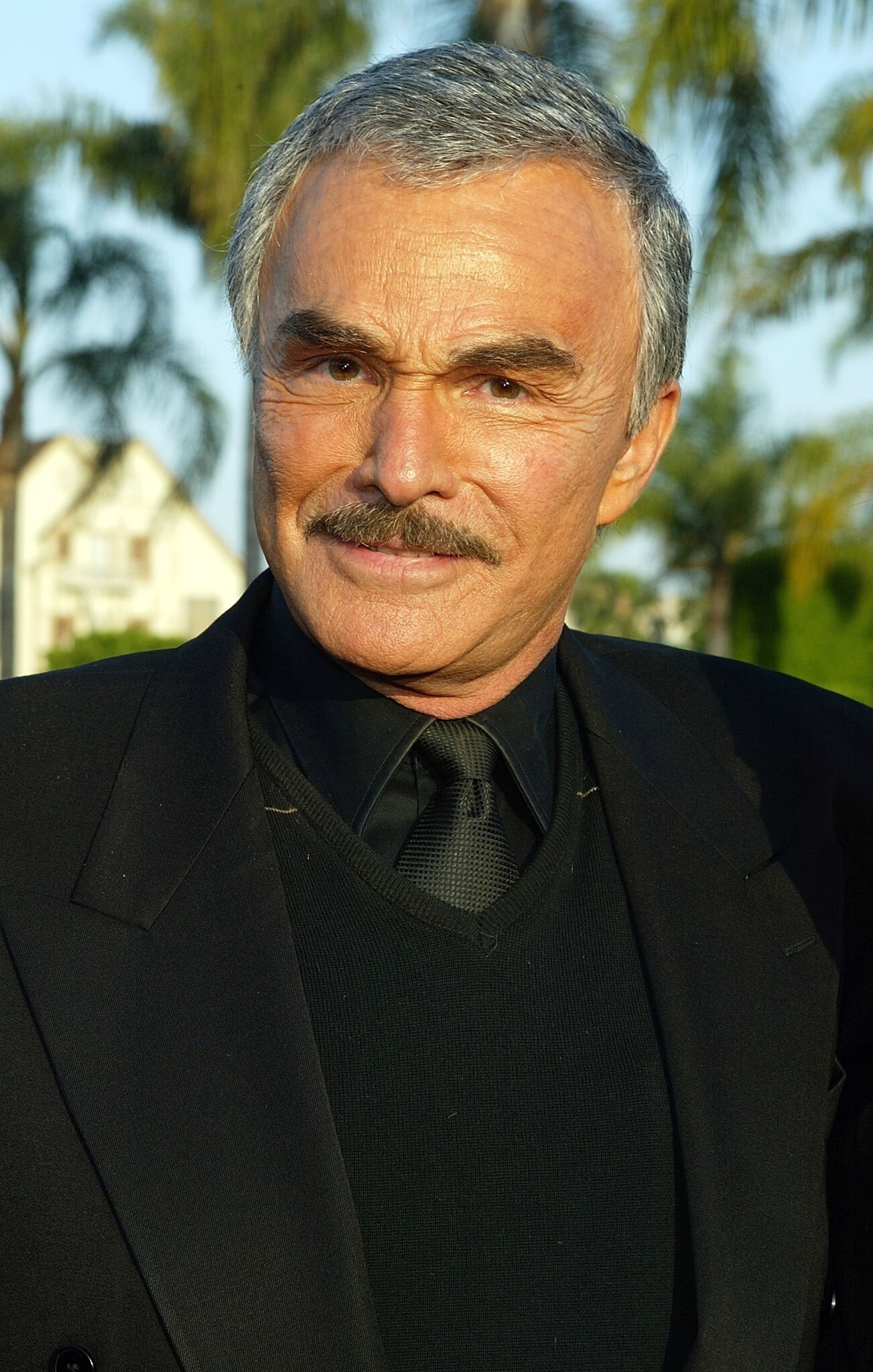 Burt Reynolds: The star of 1970s/1980s popular culture, Western roles, Playing a character of Native American descent. 1310x2050 HD Background.