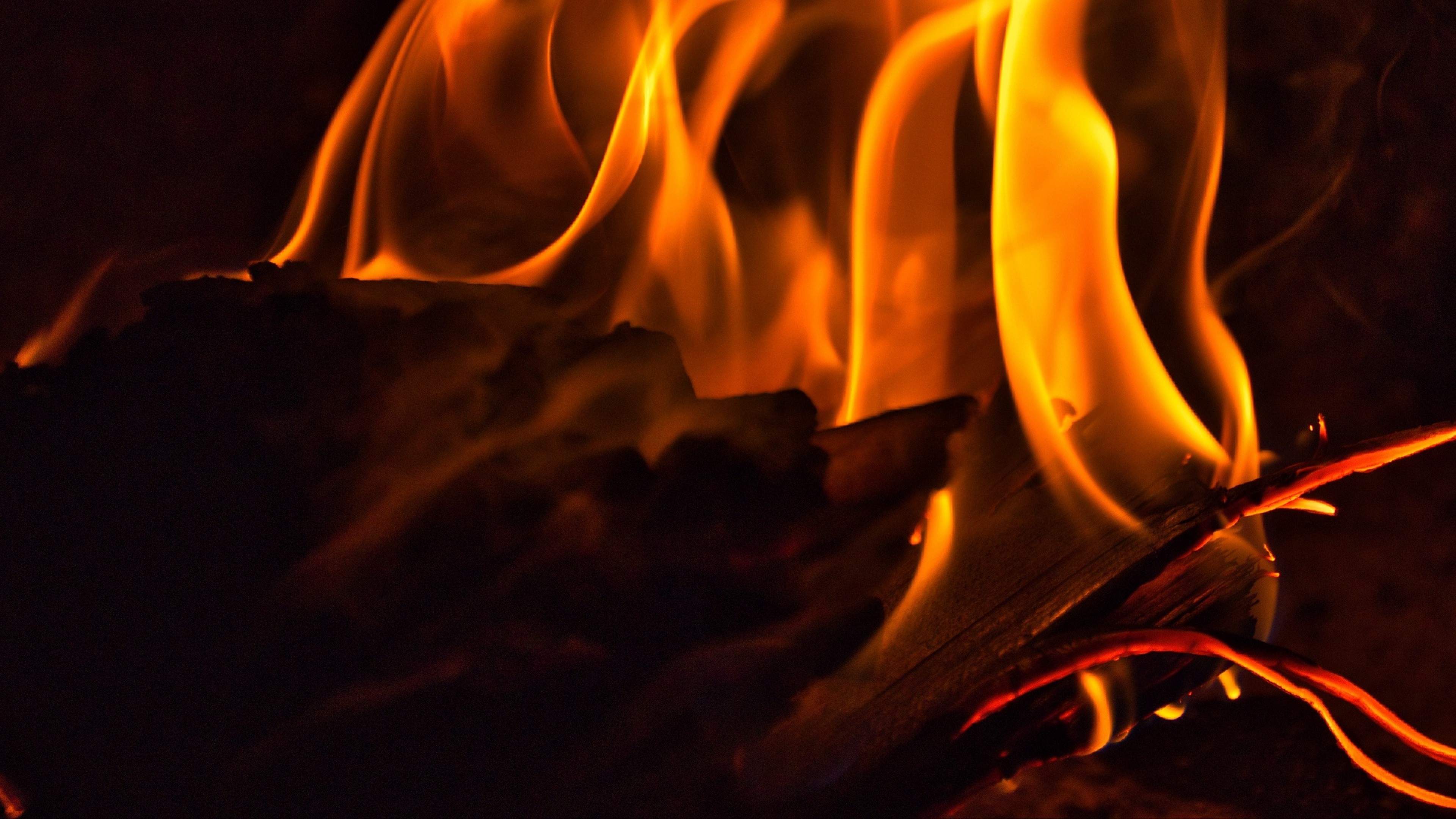 Fireplace: Wood burning, The visible effect of the process of combustion. 3840x2160 4K Background.