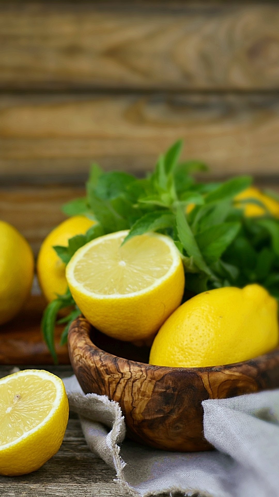 Lemon: A hybrid of the original citron and lime, A great source of vitamin C and fiber. 1080x1920 Full HD Background.