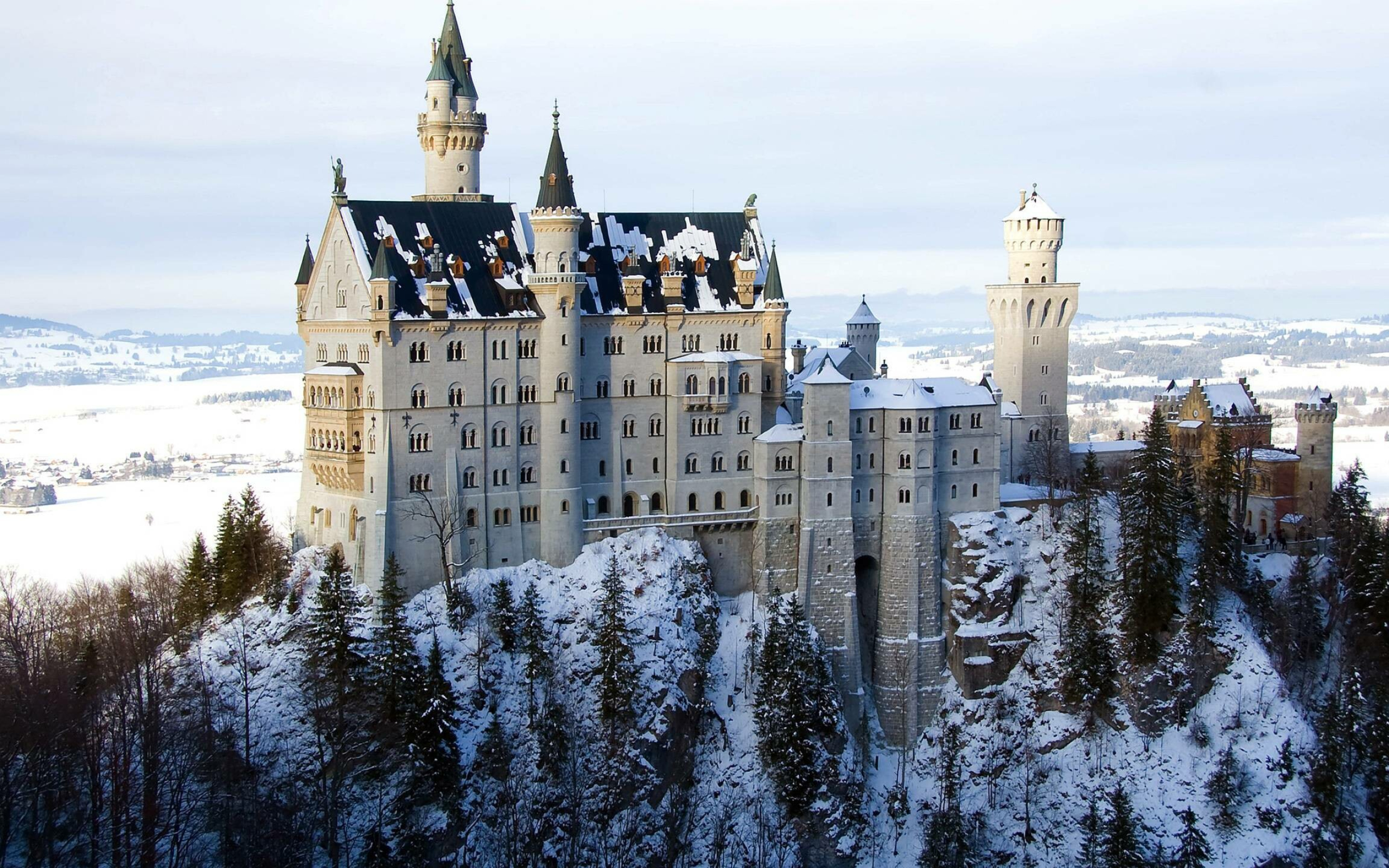 Neuschwanstein Castle: A recognizable symbol of Bavaria and Germany, King Ludwig II of Bavaria. 2560x1600 HD Background.