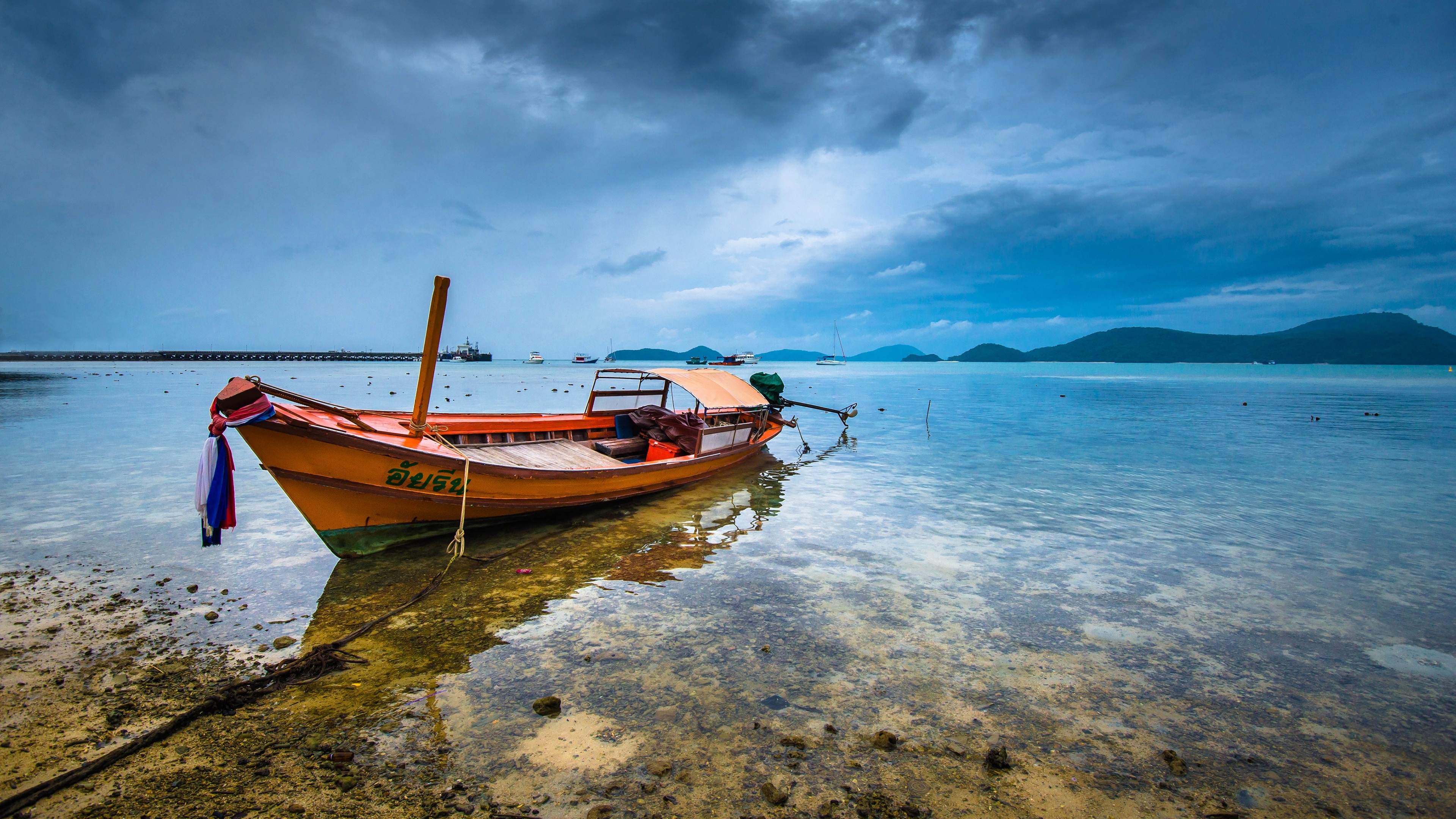 Boat: Thailand, Have served as marine transportation far into pre-historic times. 3840x2160 4K Background.