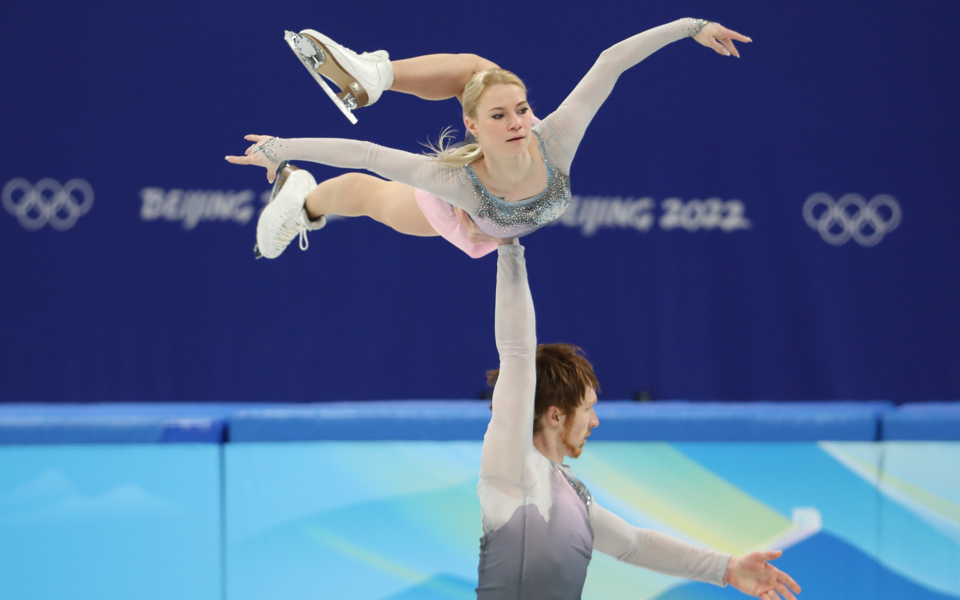 Pair Skating: The Russian skaters, Silver and bronze, Evgenia Tarasova and Vladimir Morozov. 1920x1200 HD Background.