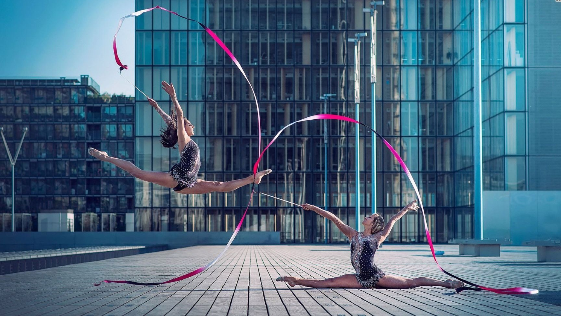 Rhythmic Gymnastics: Outdoor artistic performance by professional gymnasts, Competitive sports and choreography. 1920x1080 Full HD Background.