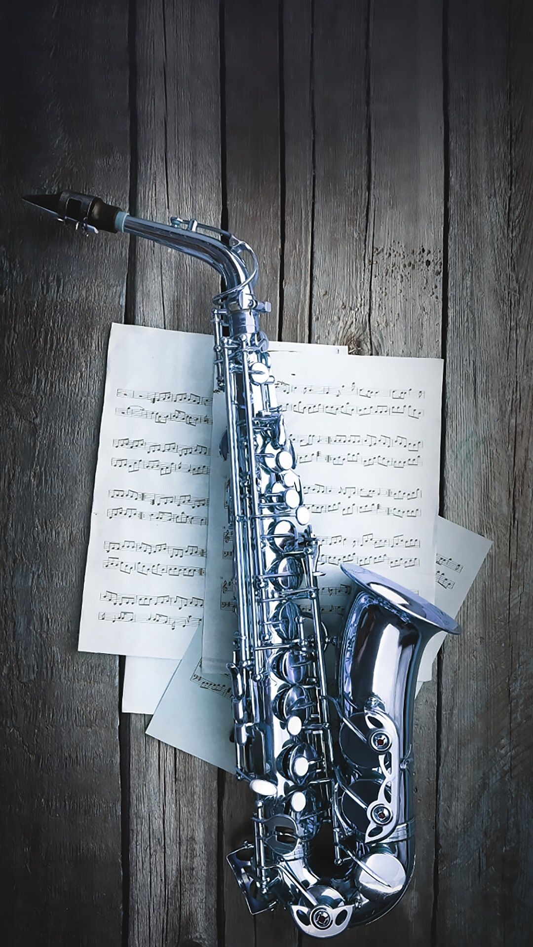 Saxophone: Sheet music, A type of single-reed woodwind instrument with a conical body. 1080x1920 Full HD Wallpaper.