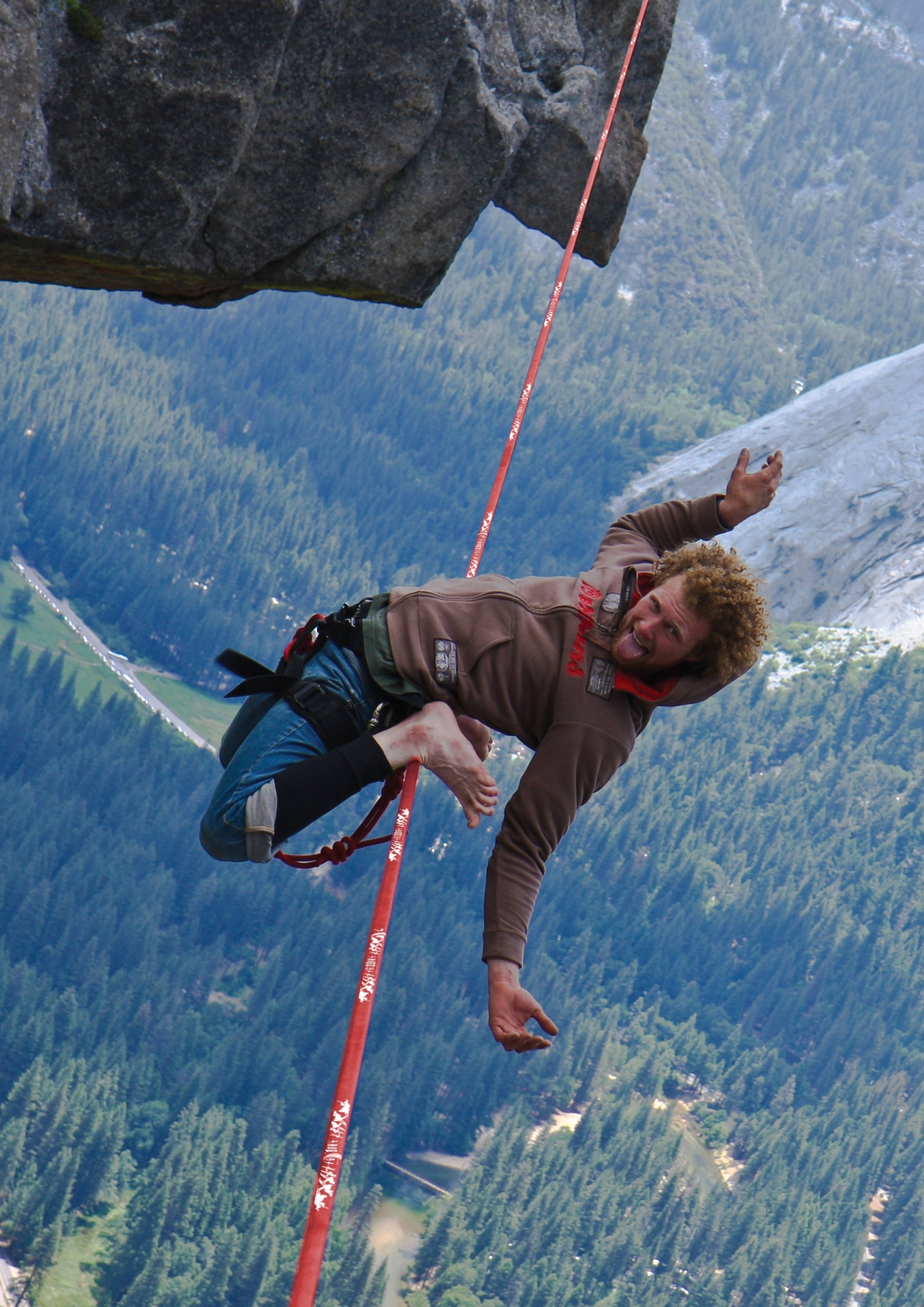 Slacklining: Walking on a rope at a high altitude, A climbing harness, Performance. 1900x2690 HD Wallpaper.