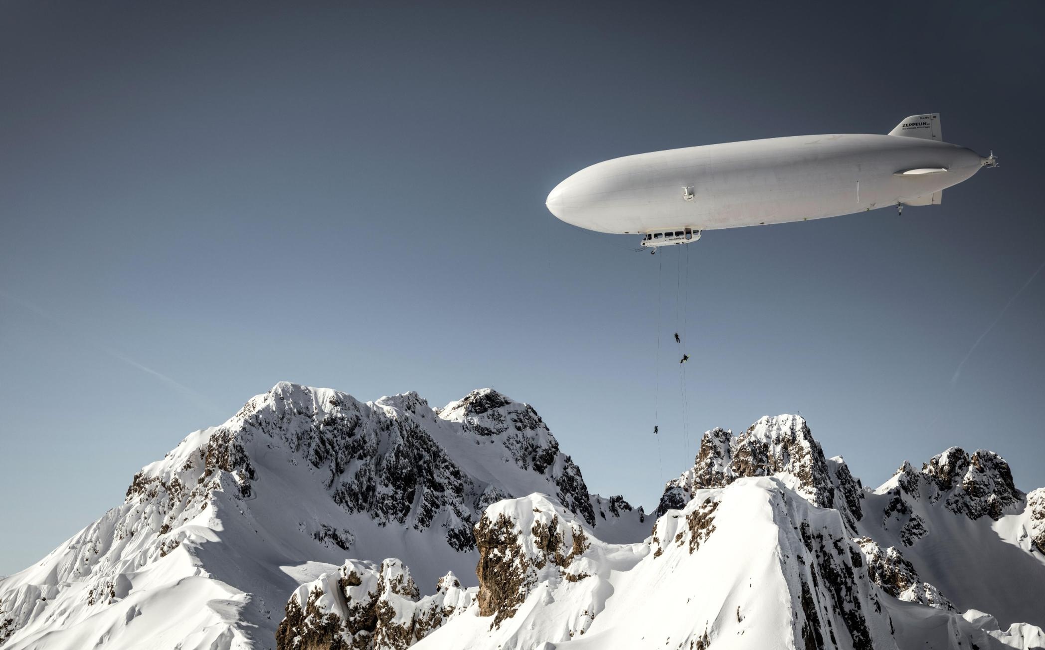 Aerial skiing, Airship adventure, Zeppelin transport, CNN coverage, 2100x1310 HD Desktop