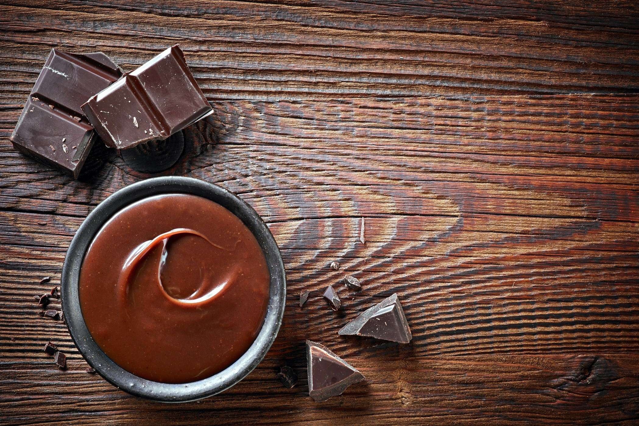 Chocolate: Food product made from cocoa beans, consumed as candy and used to make beverages. 2100x1400 HD Background.