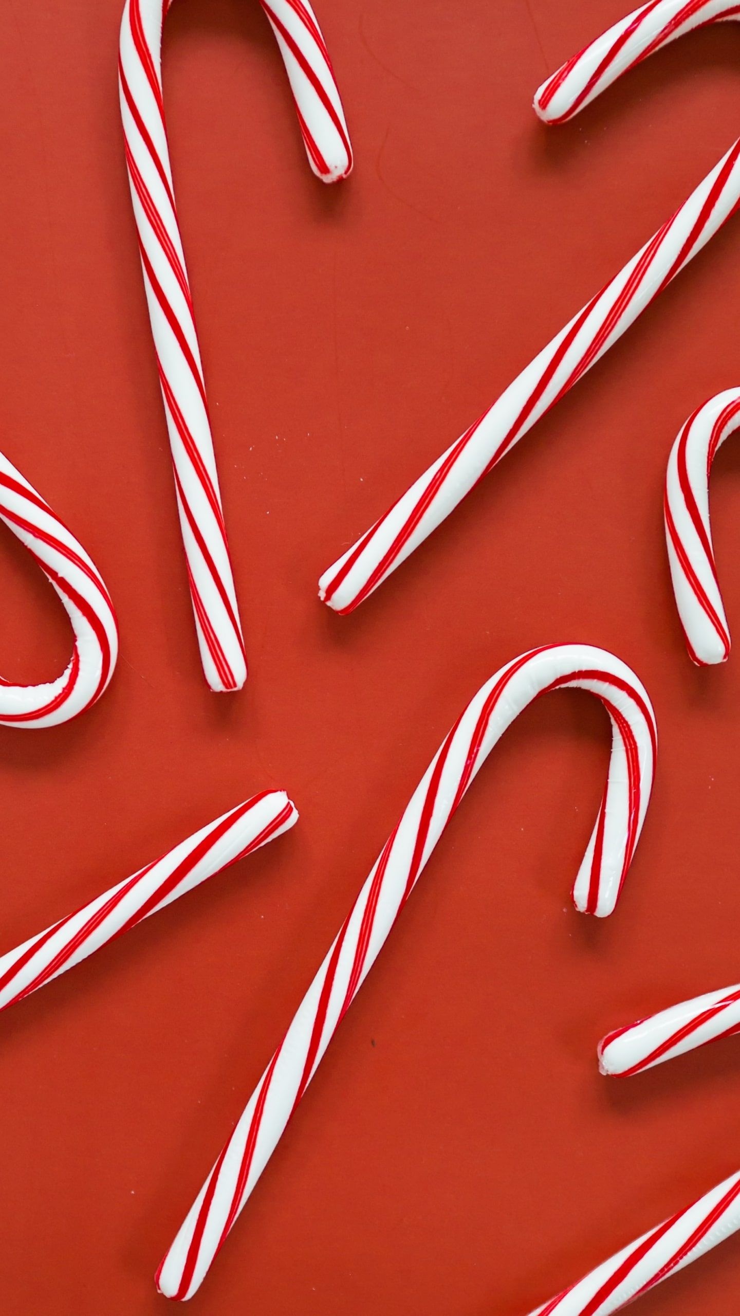 Colorful candy canes, Sweet holiday delights, Festive iPhone wallpapers, Peppermint joy, 1440x2560 HD Handy