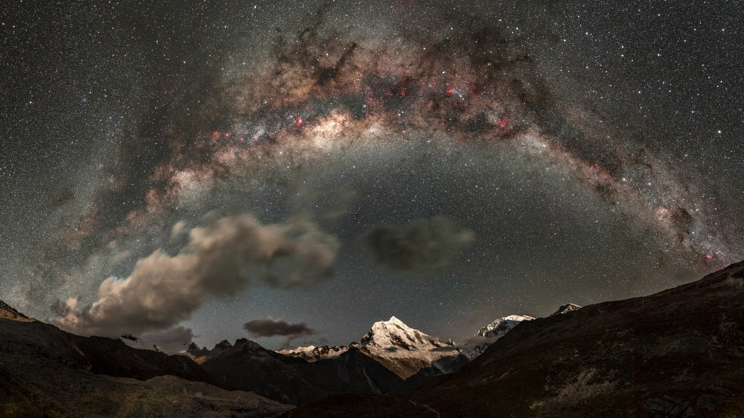 Milky Way: The galaxy will collide with Andromeda Galaxy in about 5 billion years. 2560x1440 HD Background.