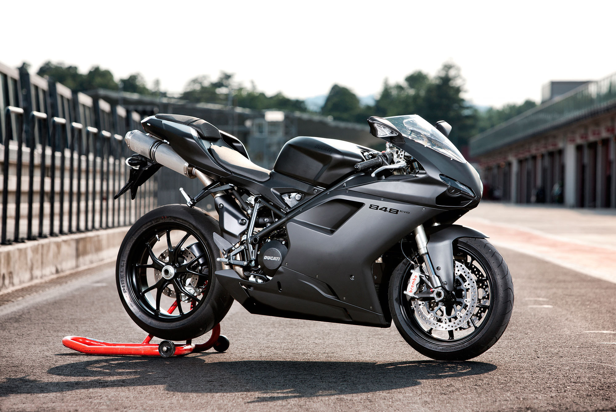 Superbike: Ducati 848 Evo, A sport bike with an improved V-twin engine. 2000x1340 HD Background.