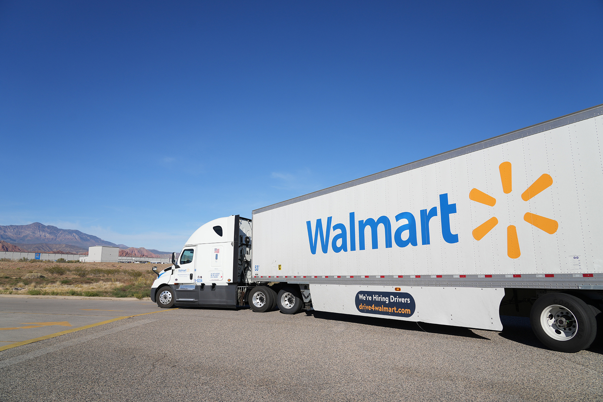 Walmart: Truck driving, Delivery, Logistics, Long-haul truck drivers, Retail chain that runs its own trucking fleet. 2000x1340 HD Background.
