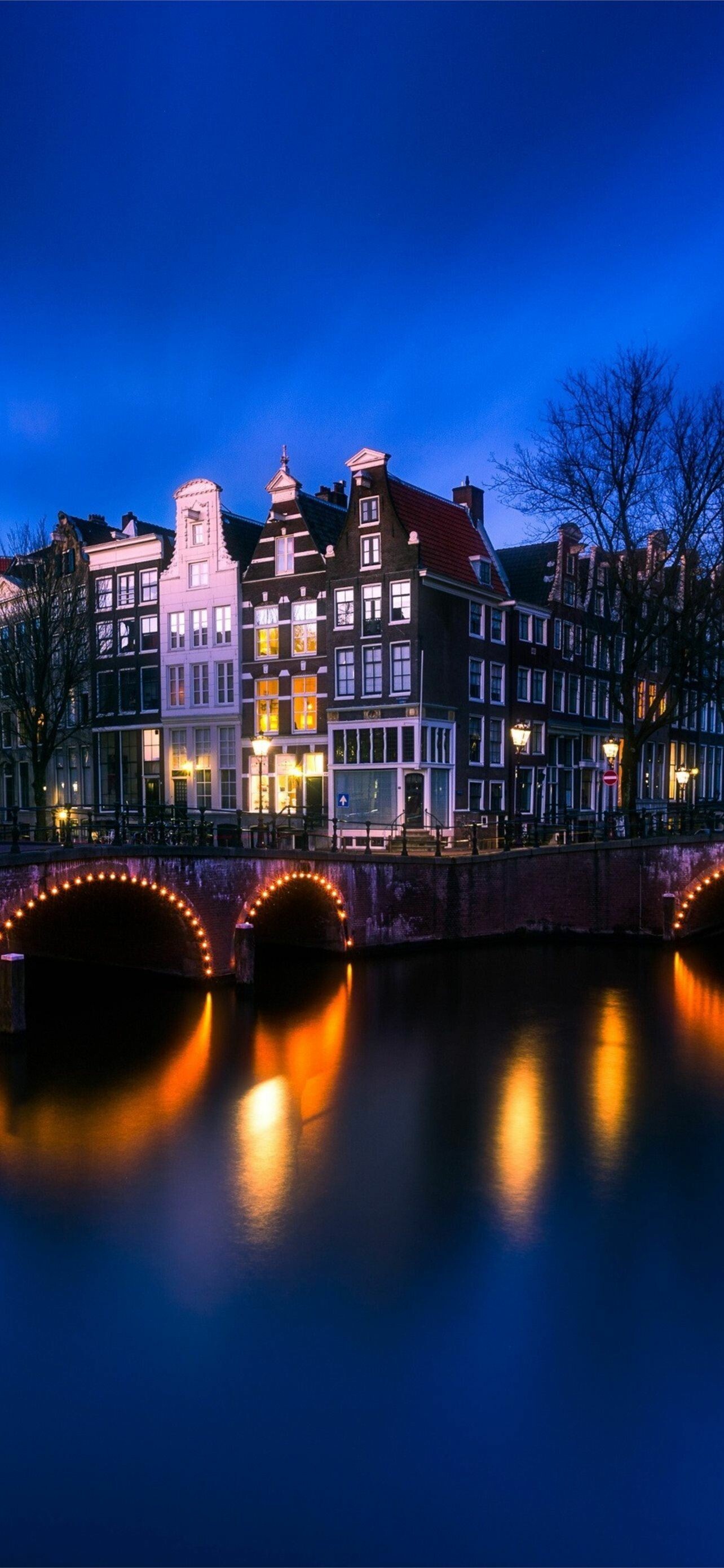 Netherlands: The canals of Amsterdam, Bridge. 1290x2780 HD Wallpaper.