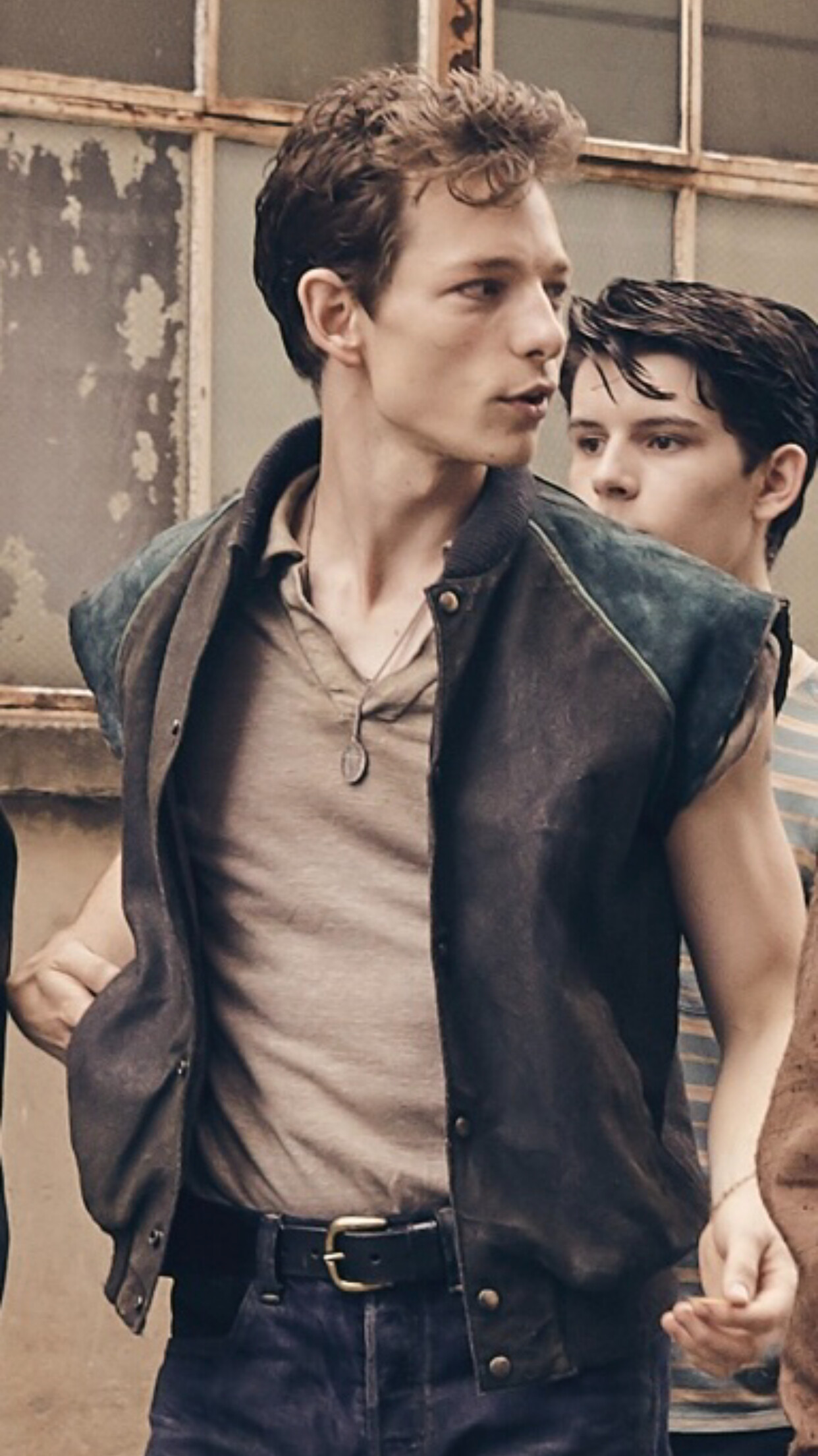 West Side Story (2021): Mike Faist as Riff, the second leader of the West Side Street Gang known as the Jets. 1250x2210 HD Background.