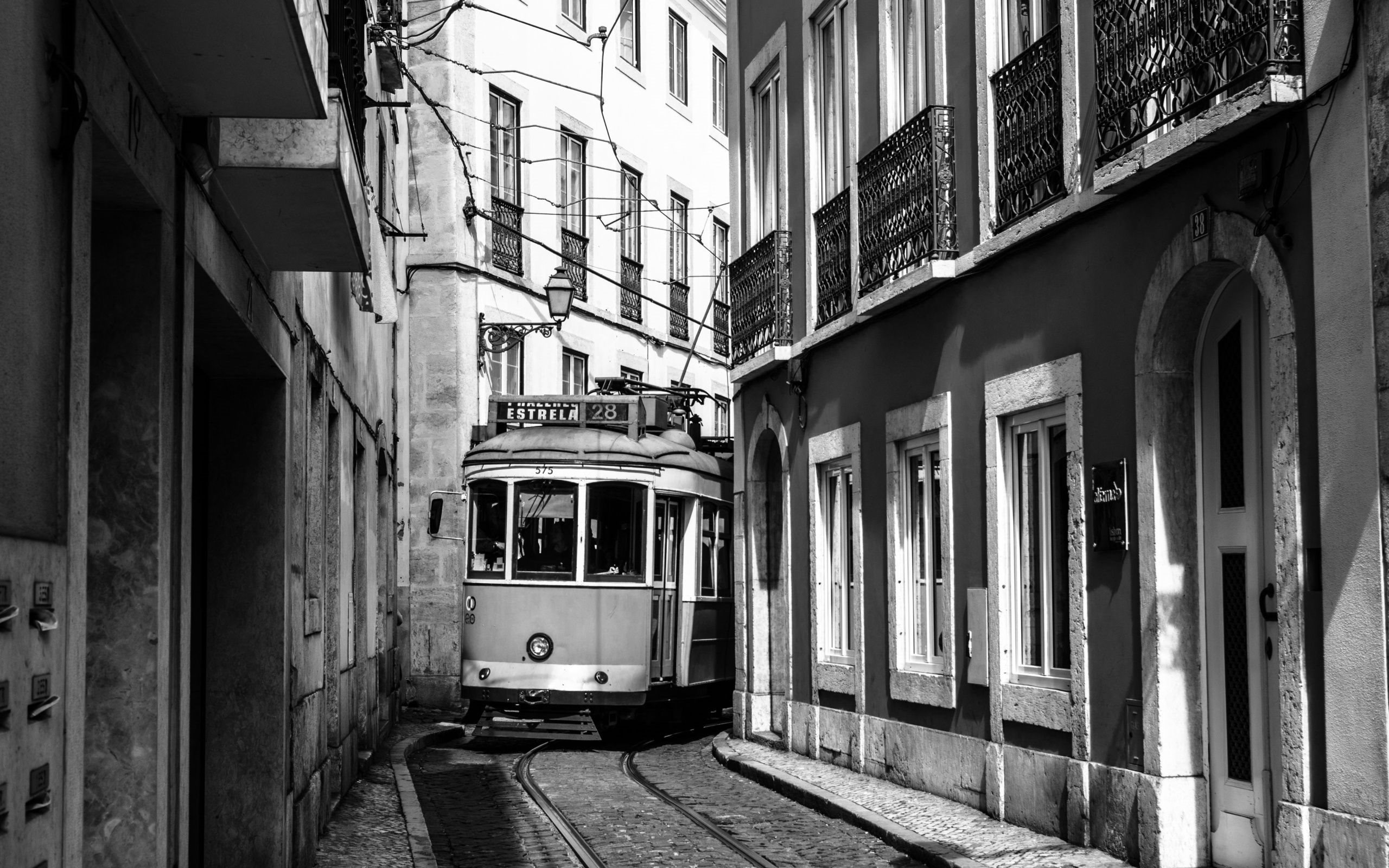 Lisbon tram, Charming narrow streets, Authentic Portuguese experience, City exploration, 2560x1600 HD Desktop