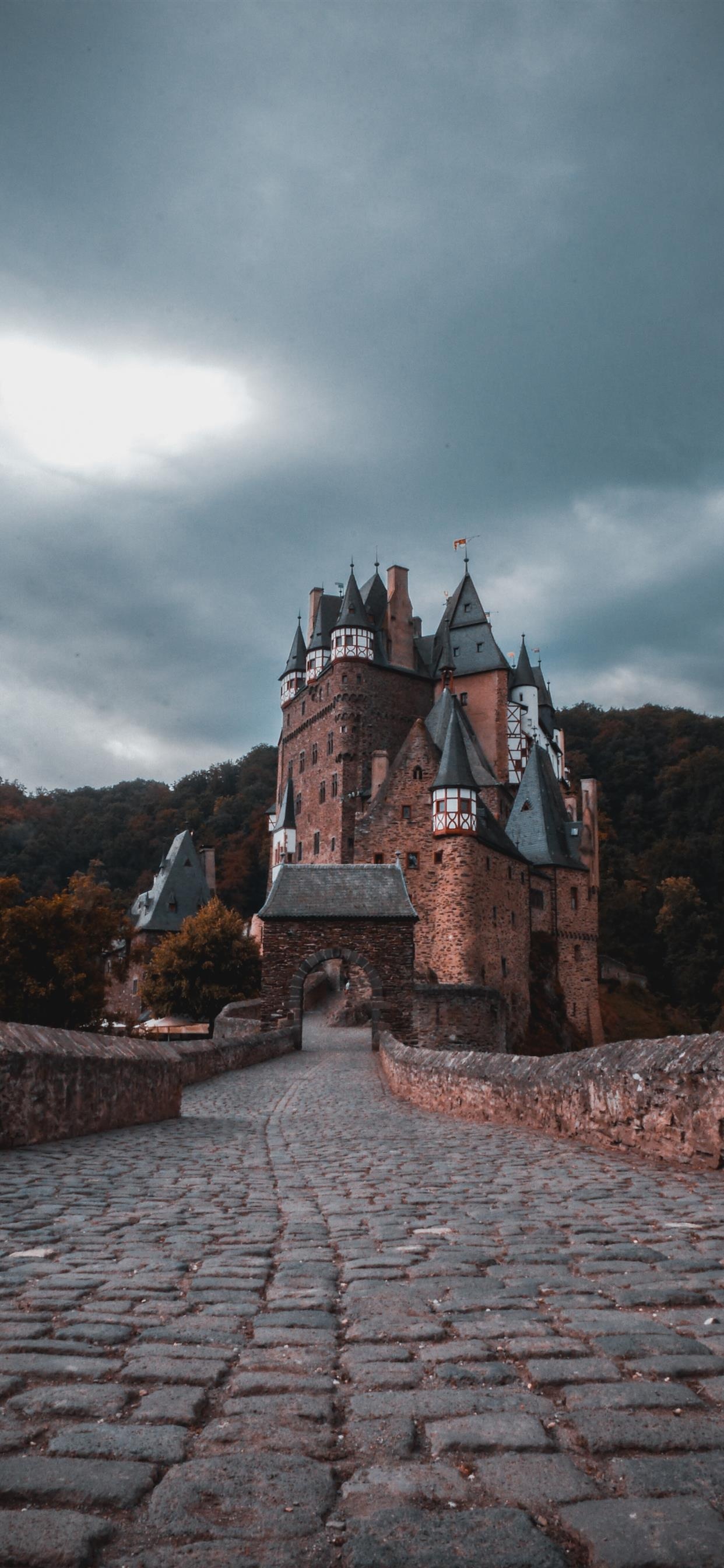 Castle: Burg Eltz, A medieval palace nestled in the hills above the Moselle between Koblenz and Trier, Germany. 1250x2690 HD Wallpaper.