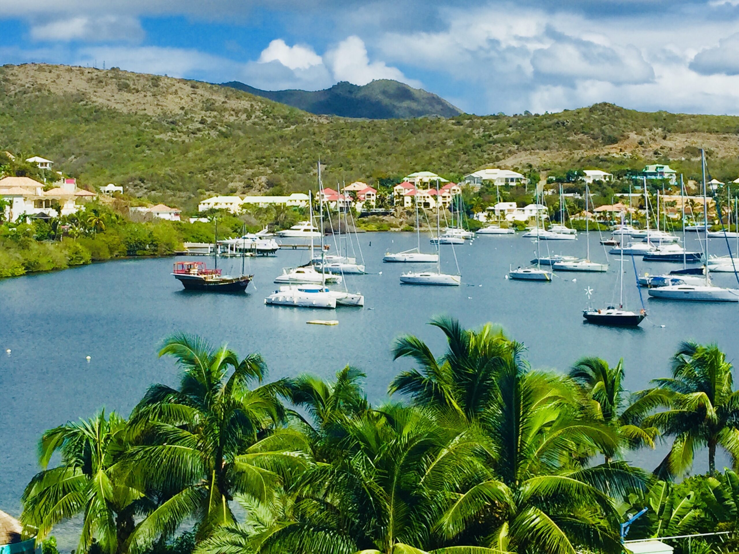 Sint Maarten, Caribbean vacation, Comparing St. Martin and Aruba, Tropical paradise getaway, 2560x1920 HD Desktop