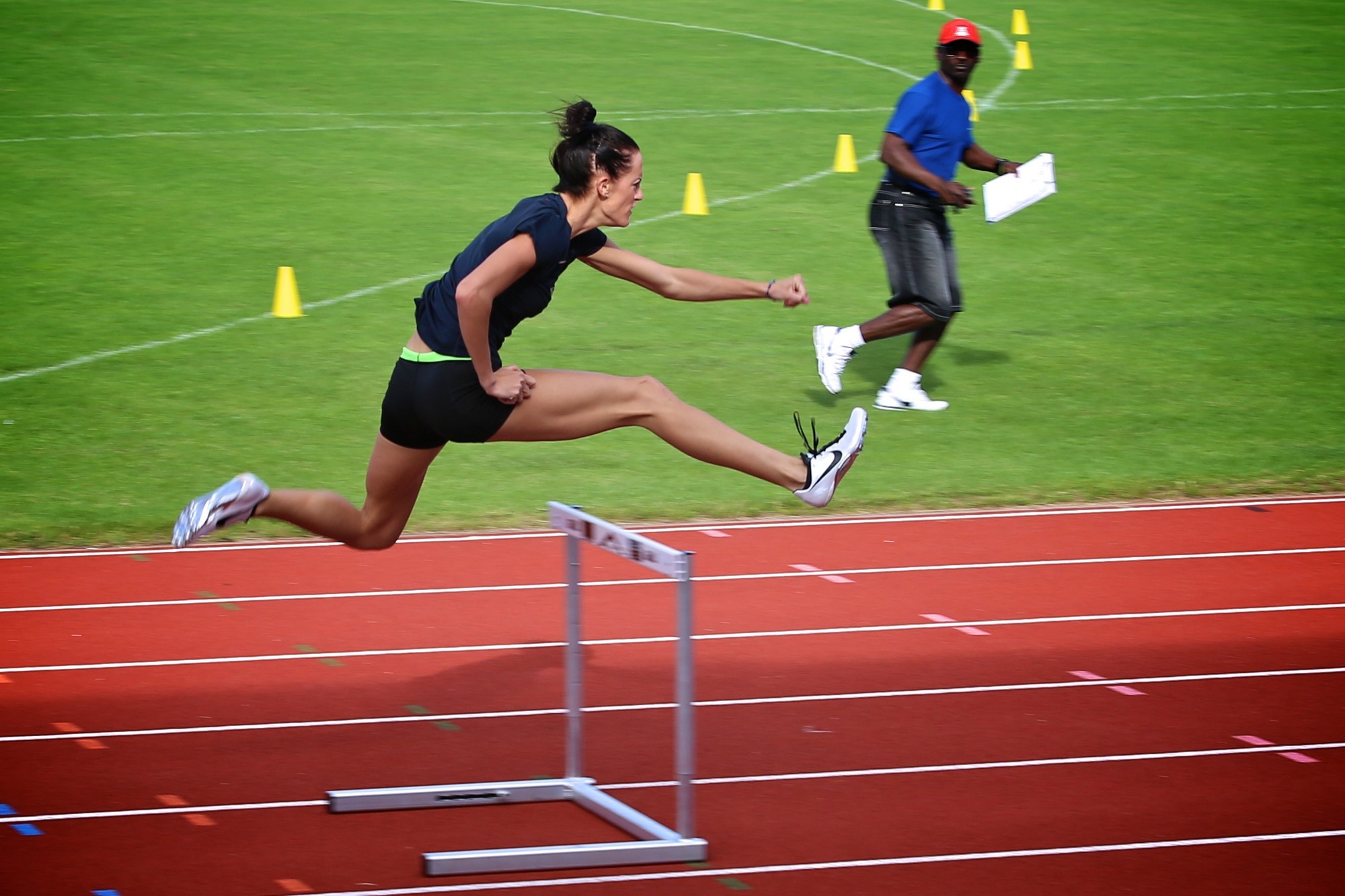Hurdling: Track Shoes, Hurdles, Short distance running, Track and field tournament. 2000x1340 HD Background.