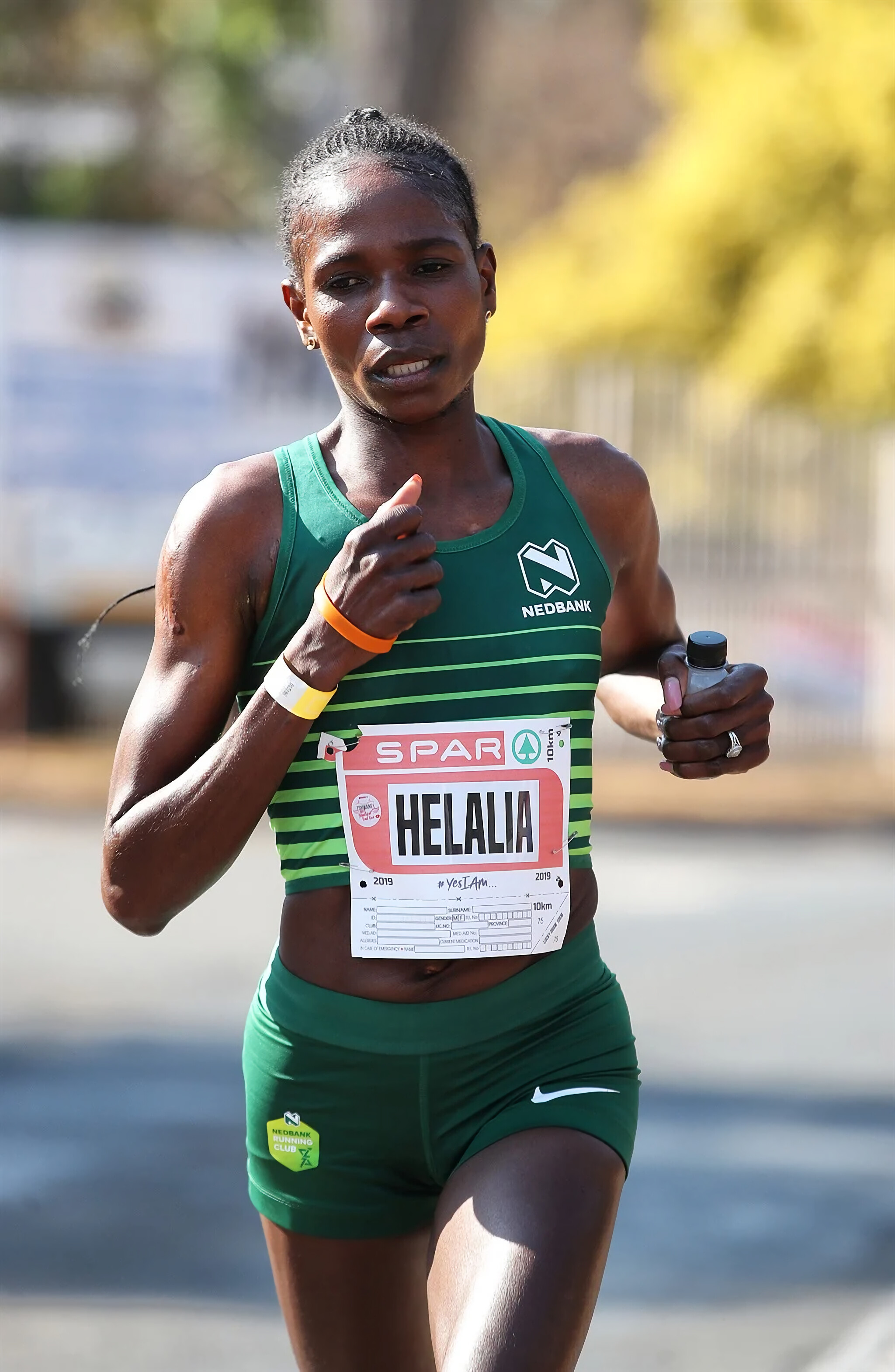 Helalia Johannes, Podium contender, Gritty performance, Unstoppable force, 2050x3140 HD Phone