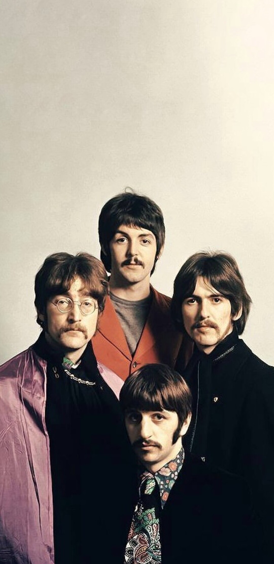 The Beatles: Sgt. Pepper's Lonely Hearts Club Band became their eighth studio album. 1080x2220 HD Background.