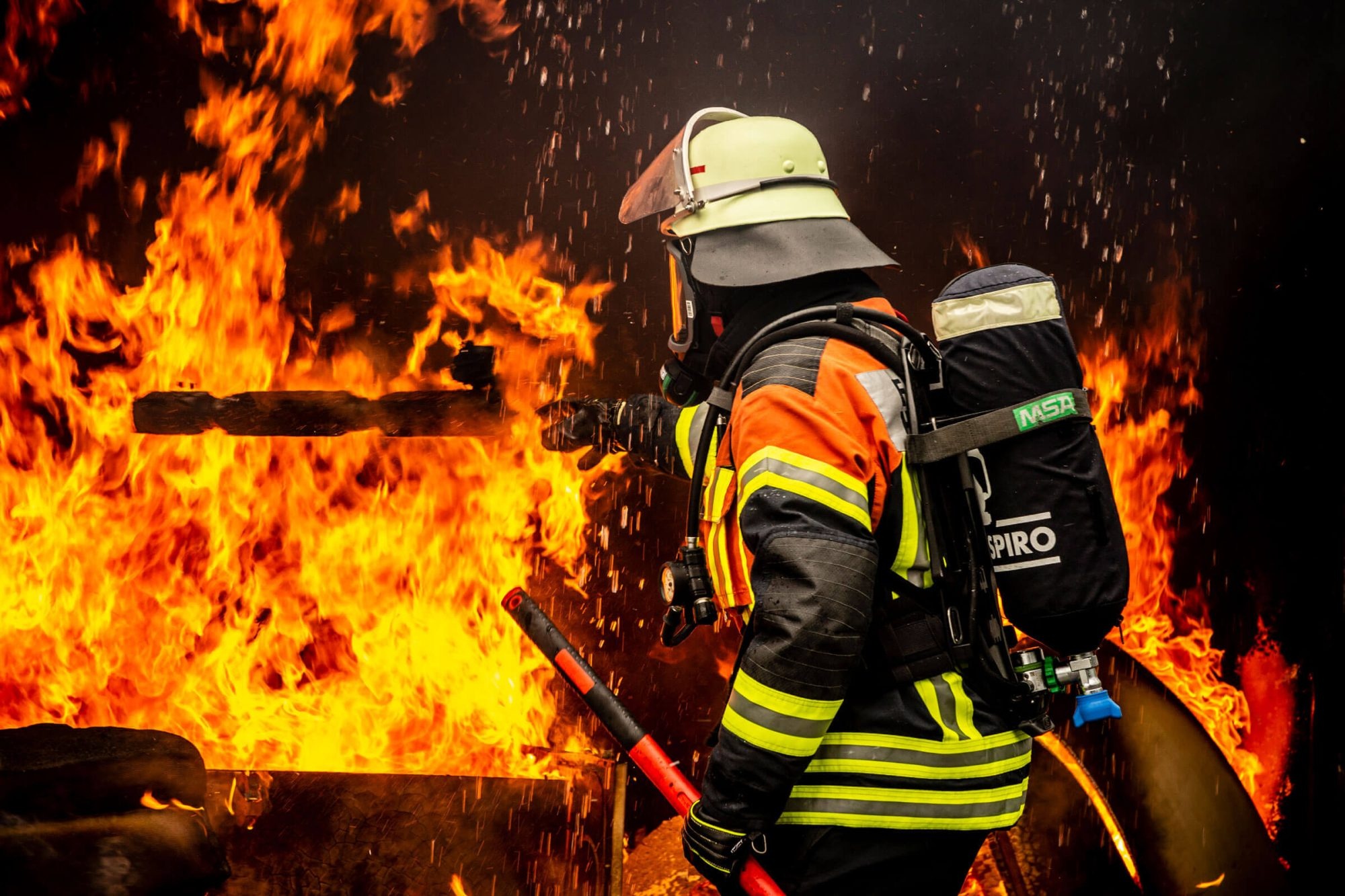 Fireman: Fire department, One of the three main emergency services. 2000x1340 HD Background.