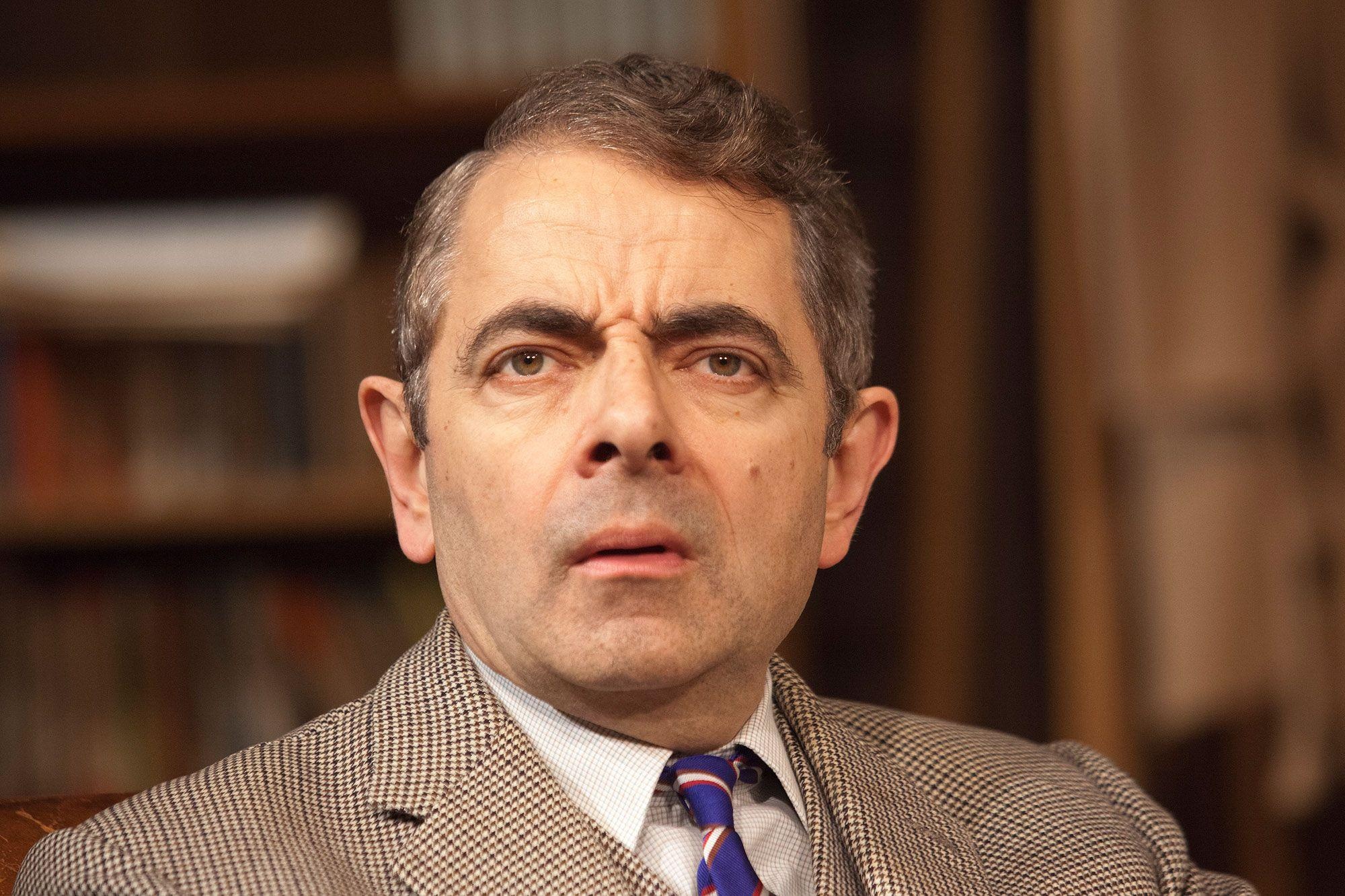 Rowan Atkinson: Took a leading role in Dead on Time (1983) with Nigel Hawthorne. 2000x1340 HD Background.