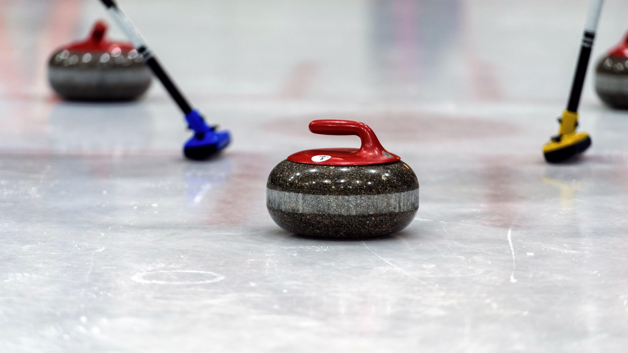 Curling: Heavy, polished granite rocks and brooms - the primary equipment for an official Olympic winter sport. 2560x1440 HD Wallpaper.