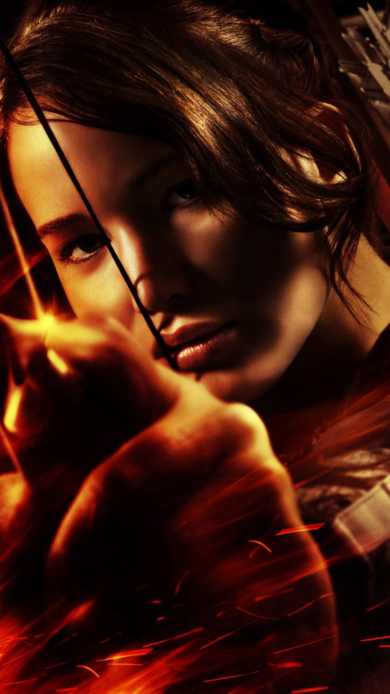 Hunger Games: A 2012 American dystopian action film directed by Gary Ross. 1540x2740 HD Background.