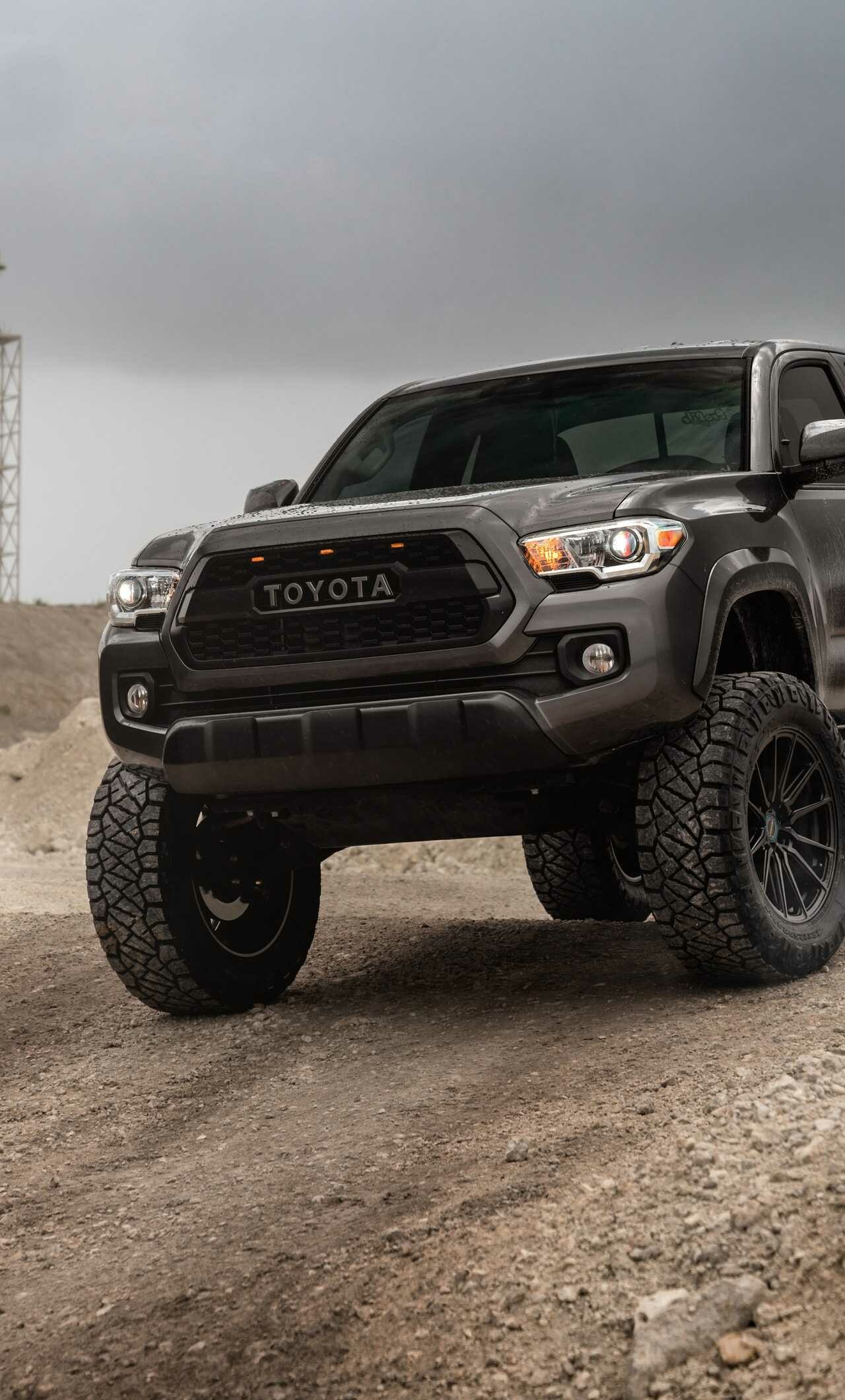 Toyota Tacoma: The T/X Baja package includes TRD Bilstein coil-overs at the front and TRD Bilstein reservoir shocks at the rear. 1280x2120 HD Background.