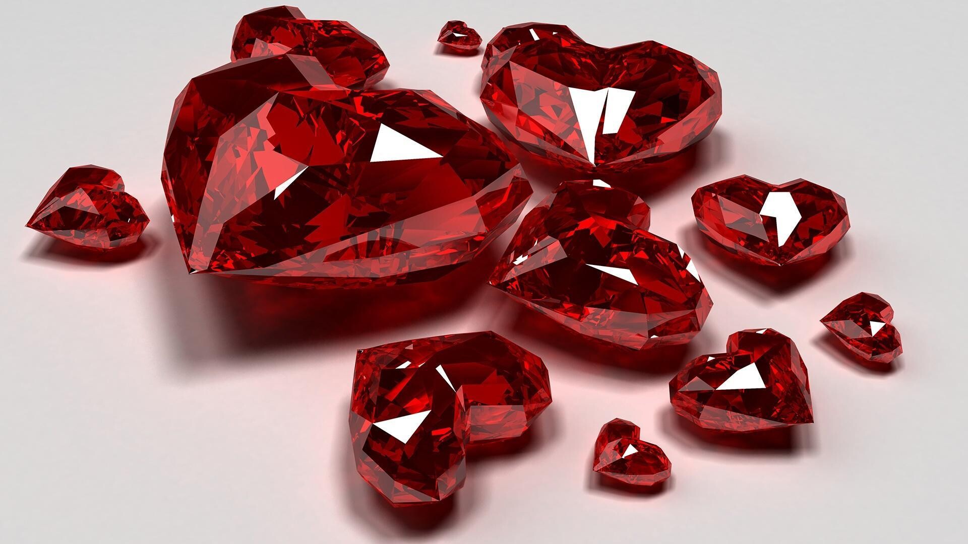 Gemstone: Ruby hearts, A crystalline rock that can be cut and polished for jewelry. 1920x1080 Full HD Background.