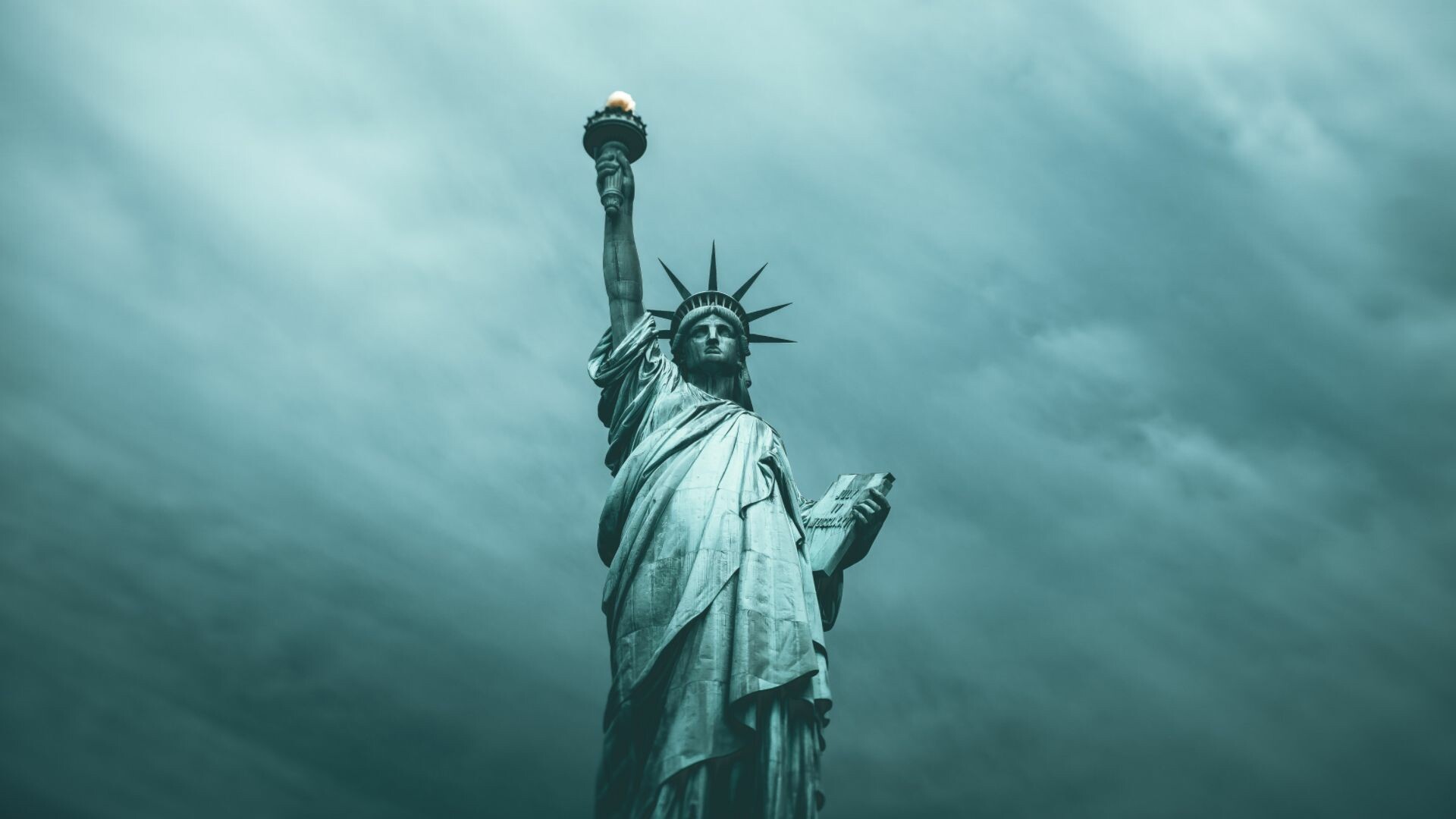 Statue of Liberty: A symbol of hope and refuge for generations of immigrants, USA. 1920x1080 Full HD Wallpaper.