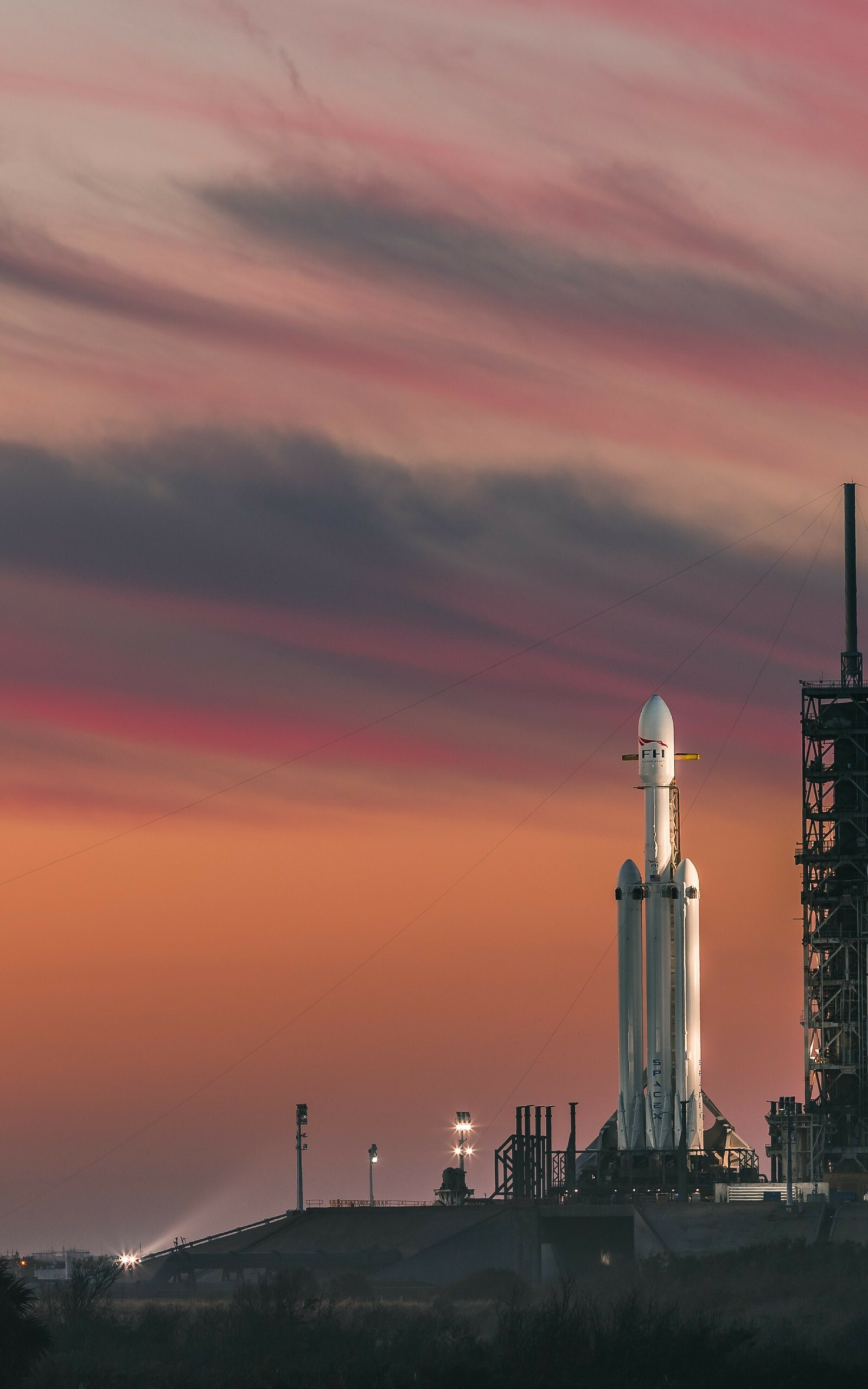 SpaceX: Falcon Heavy, The rocket consists of two strap-on boosters. 1600x2560 HD Background.