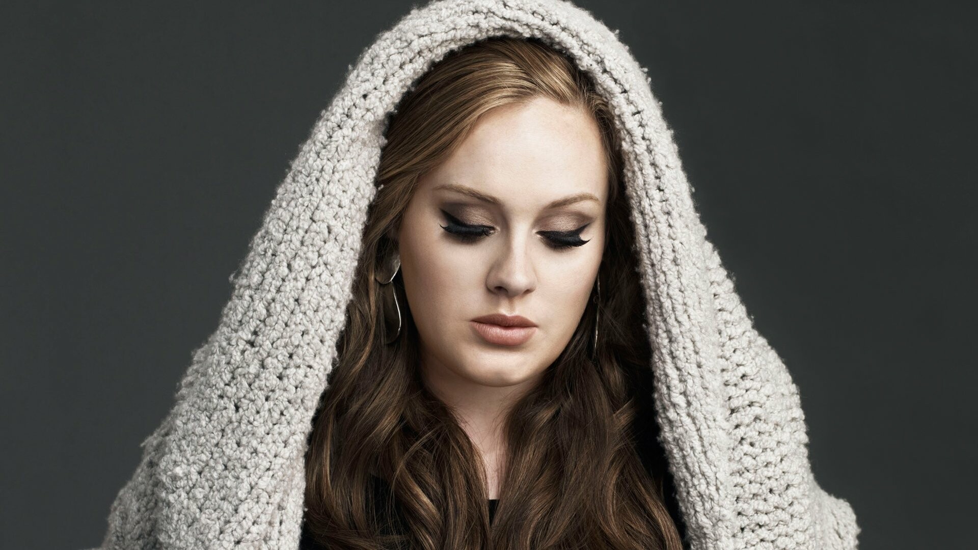 Adele: An English singer-songwriter, Known for her impressive ballads and mesmerizing voice. 1920x1080 Full HD Background.