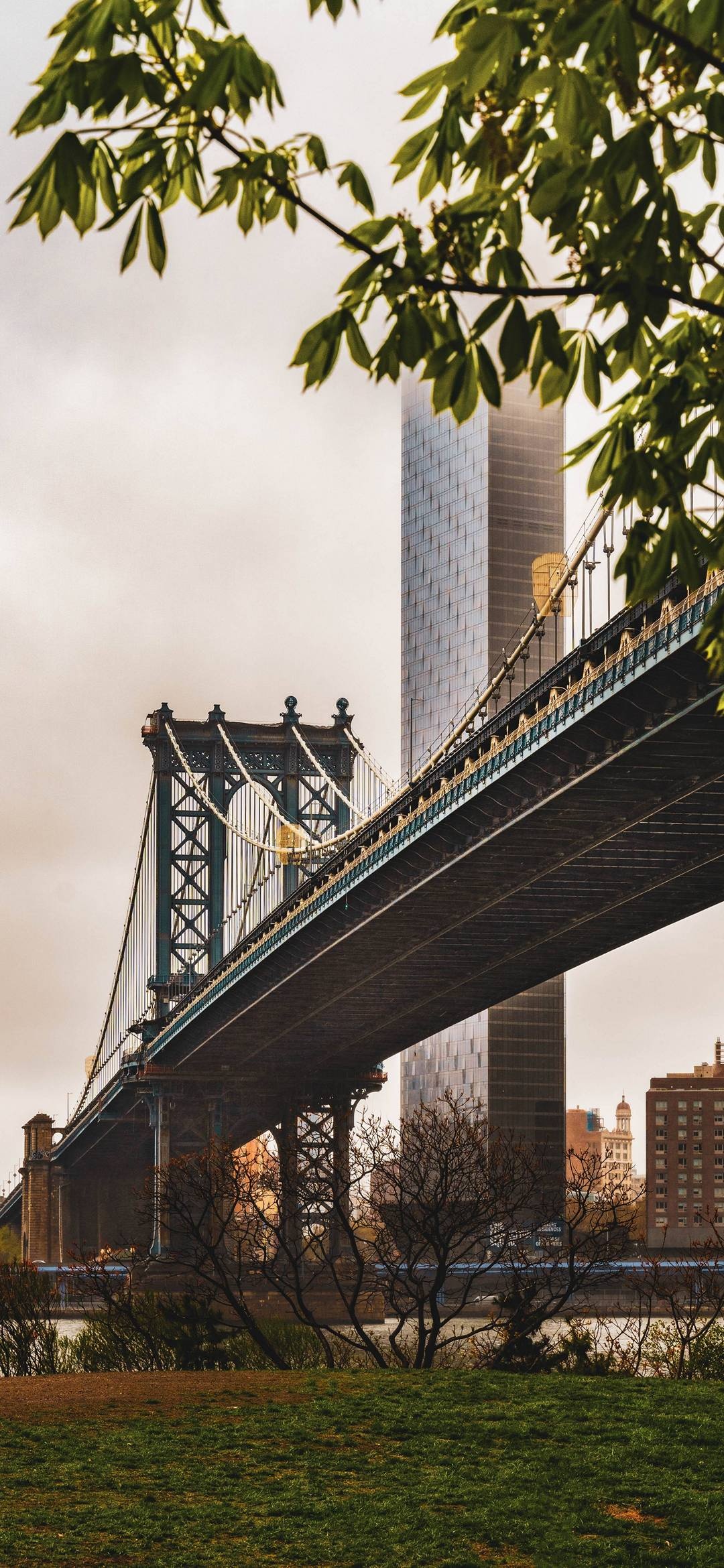 Bridge: Manhattan span, The East River in New York City, Brooklyn borough. 1080x2340 HD Background.