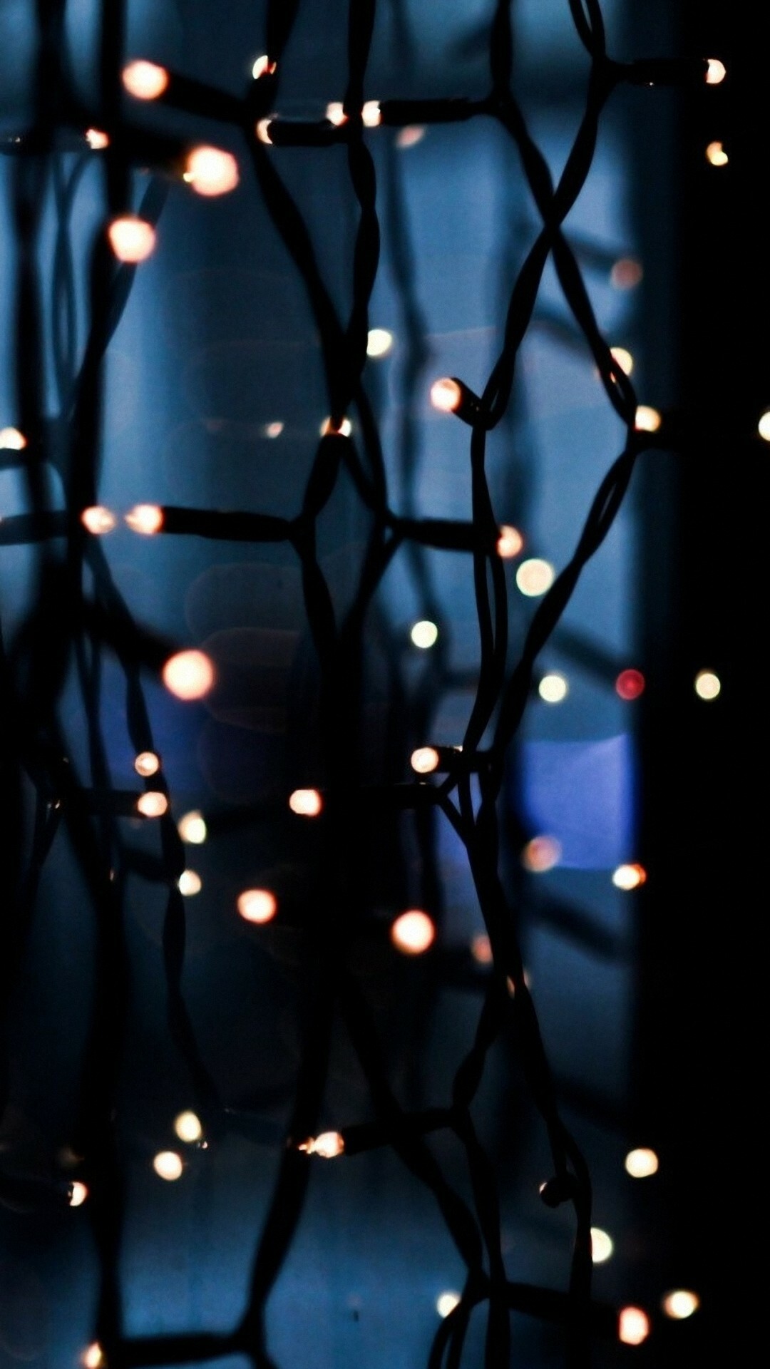 Fairy Lights: Small colored electric bulbs strung together and used for decoration. 1080x1920 Full HD Background.