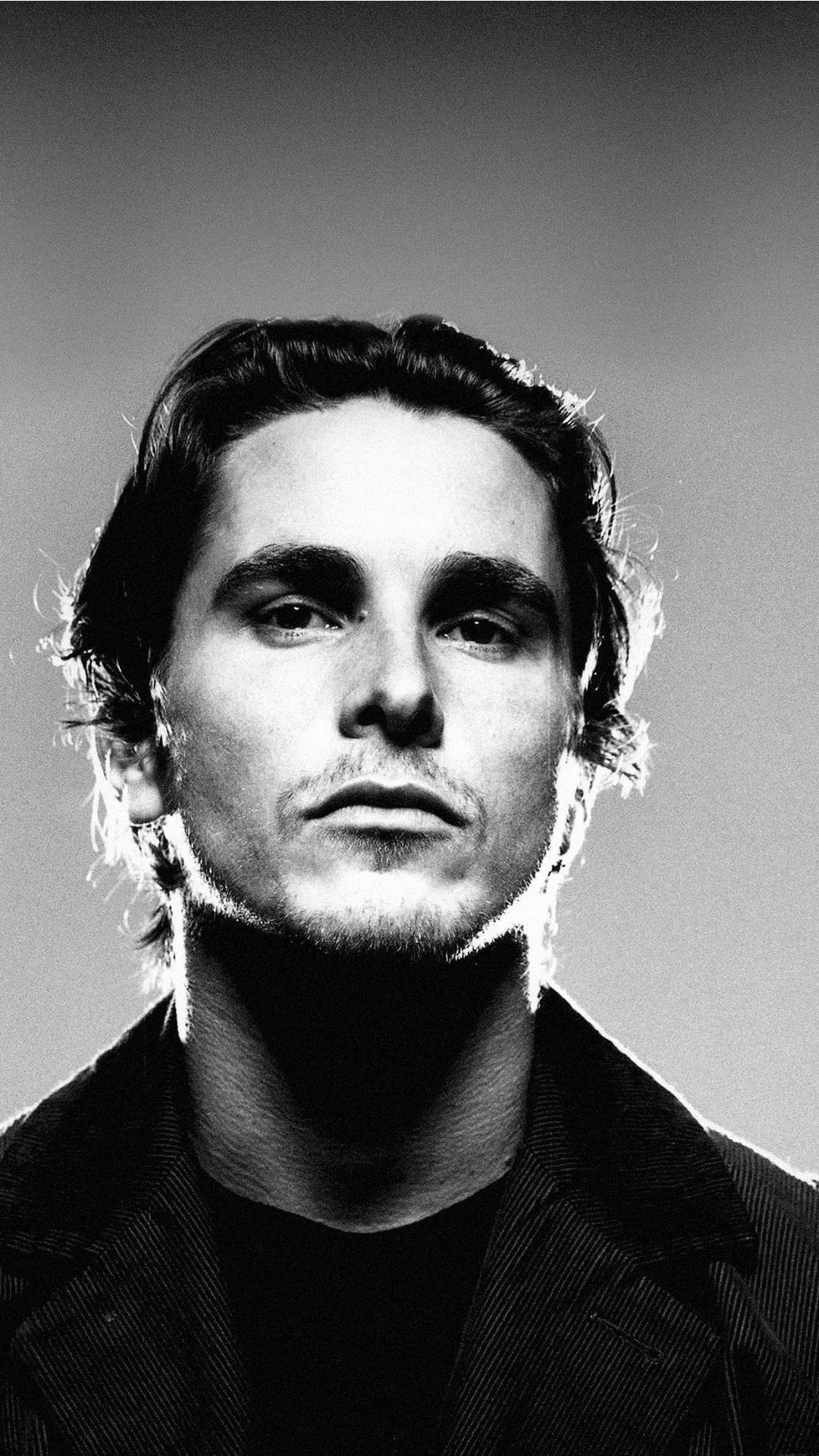 Christian Bale: Produced and appeared in David O. Russell's period film Amsterdam, Monochrome. 1080x1920 Full HD Background.