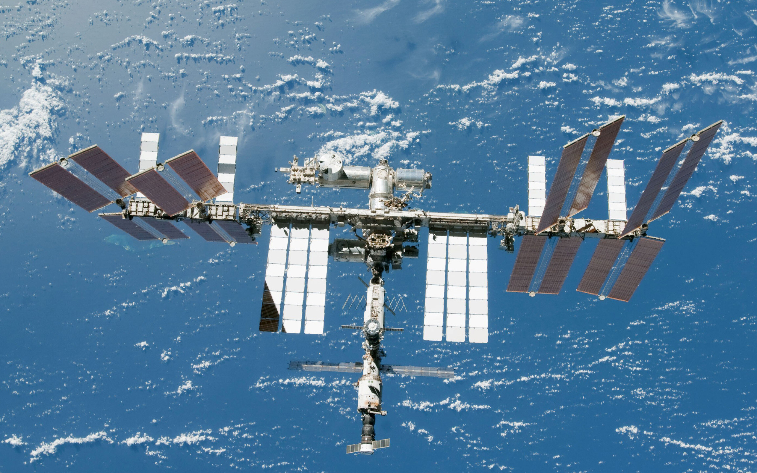ISS: International Space Station, Maintains an orbit with an average altitude of 250 miles. 2560x1600 HD Wallpaper.