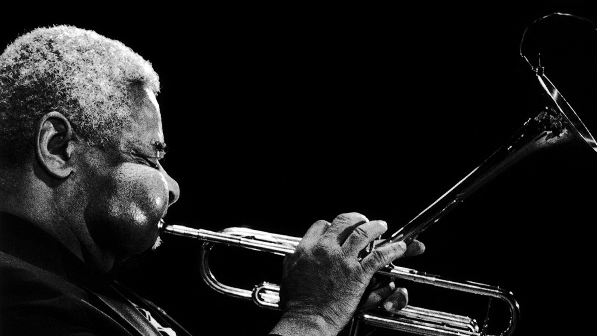 Trumpet: Dizzy Gillespie, An American jazz trumpeter, bandleader, and singer, The virtuoso style. 1920x1080 Full HD Background.