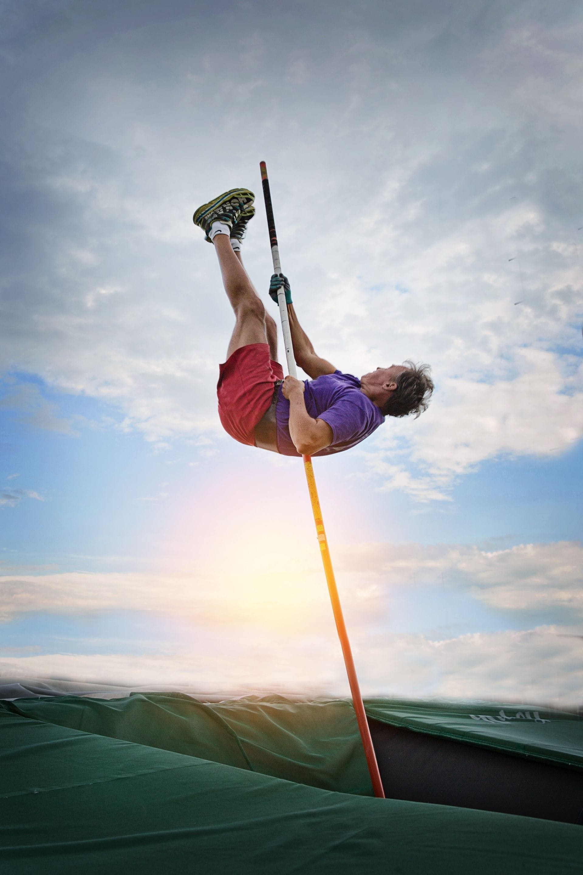 Pole Vaulting: A competition in which athletes jump as high as possible using long and flexible pole. 1920x2880 HD Wallpaper.