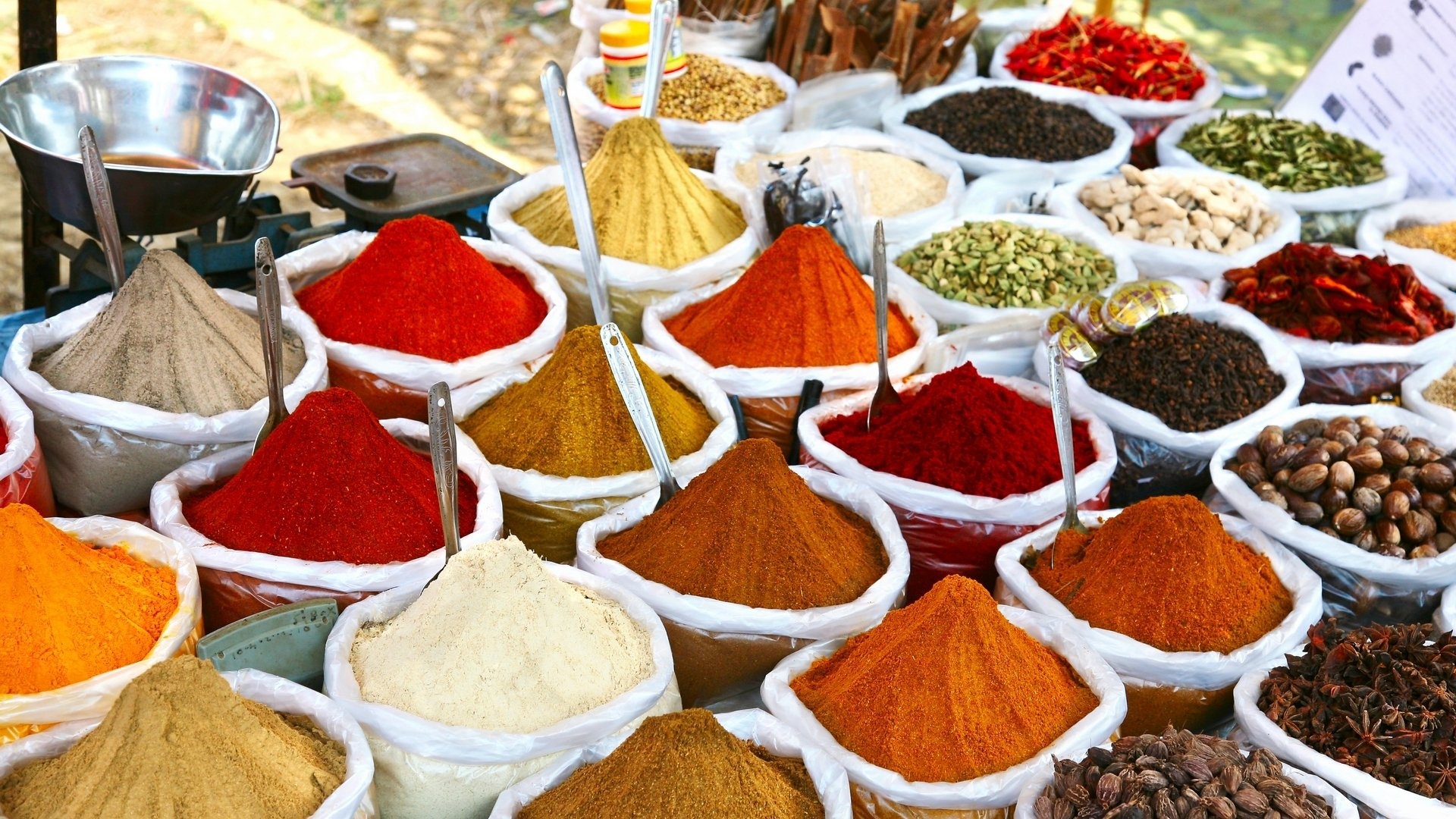 Spices: Red chili powder, Used alone or blended, whole or powdered. 1920x1080 Full HD Background.