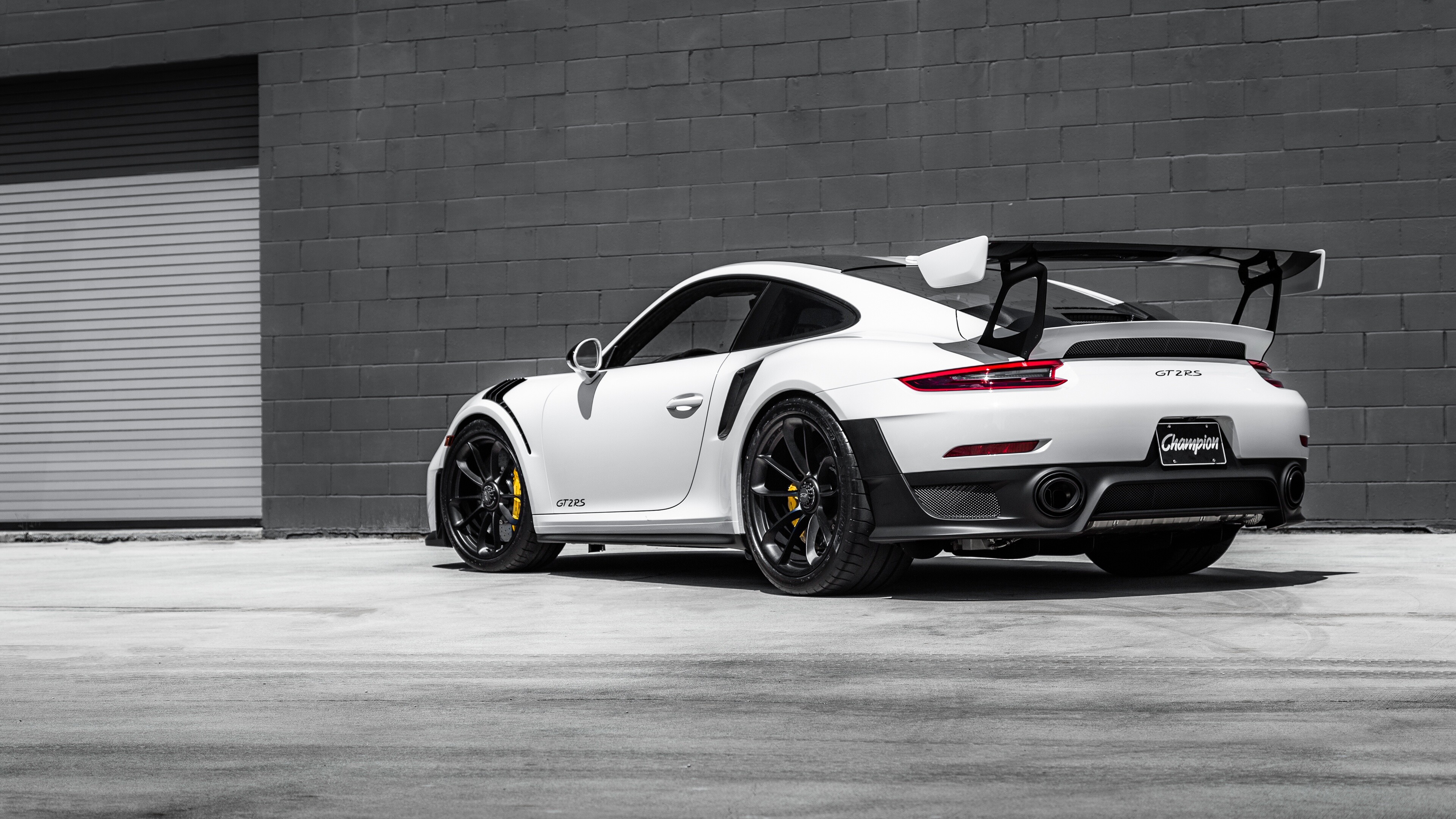 Porsche: The 911 GT2 RS basically teleports from zero to 60 mph in 2.6 seconds and disintegrate a quarter-mile drag strip in 10.3 seconds at 140 mph. 3840x2160 4K Wallpaper.