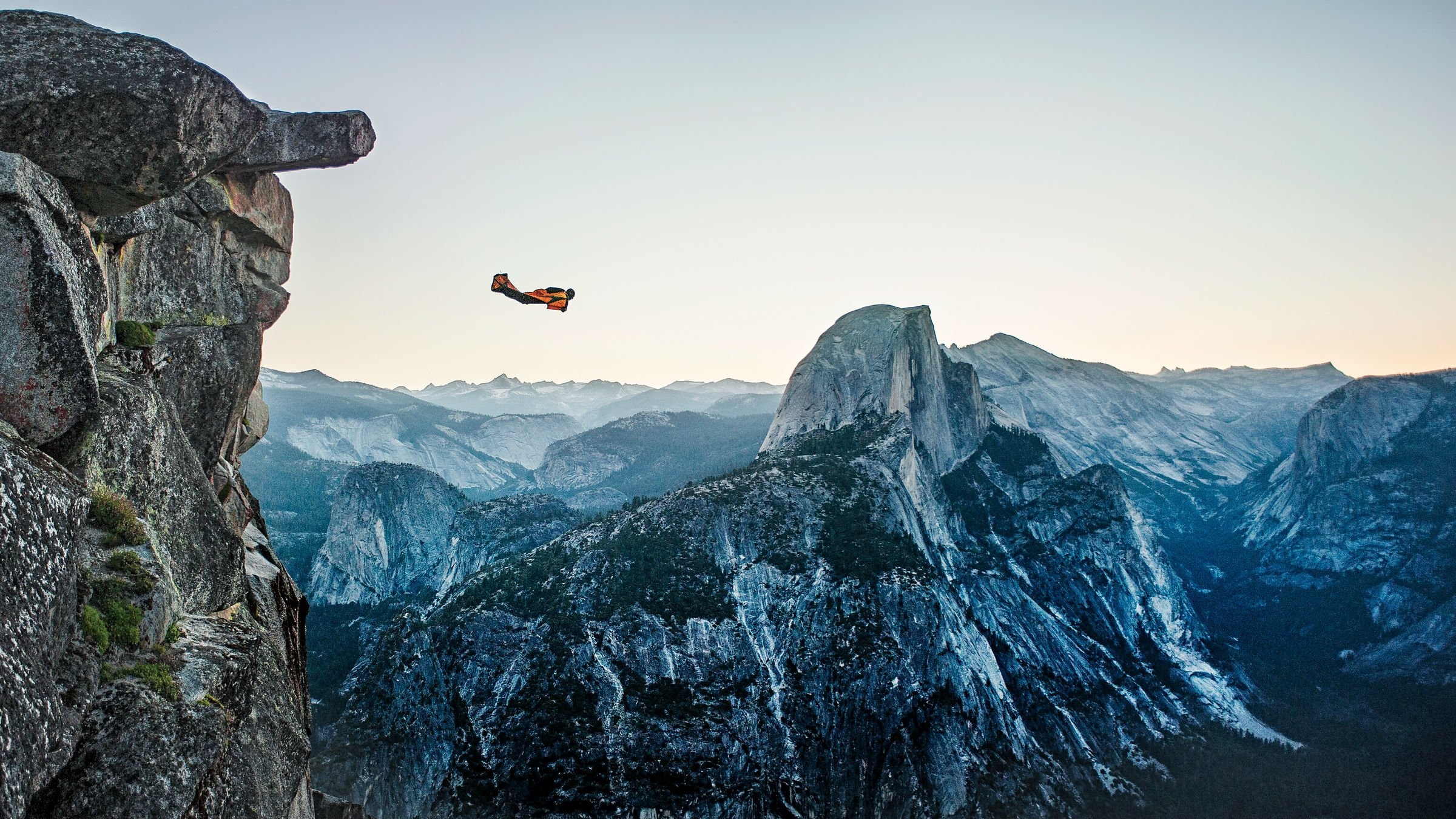Wingsuit Flying: The leap of faith, Wingsuit skydiving in the mountains, Extreme sport. 2400x1350 HD Background.
